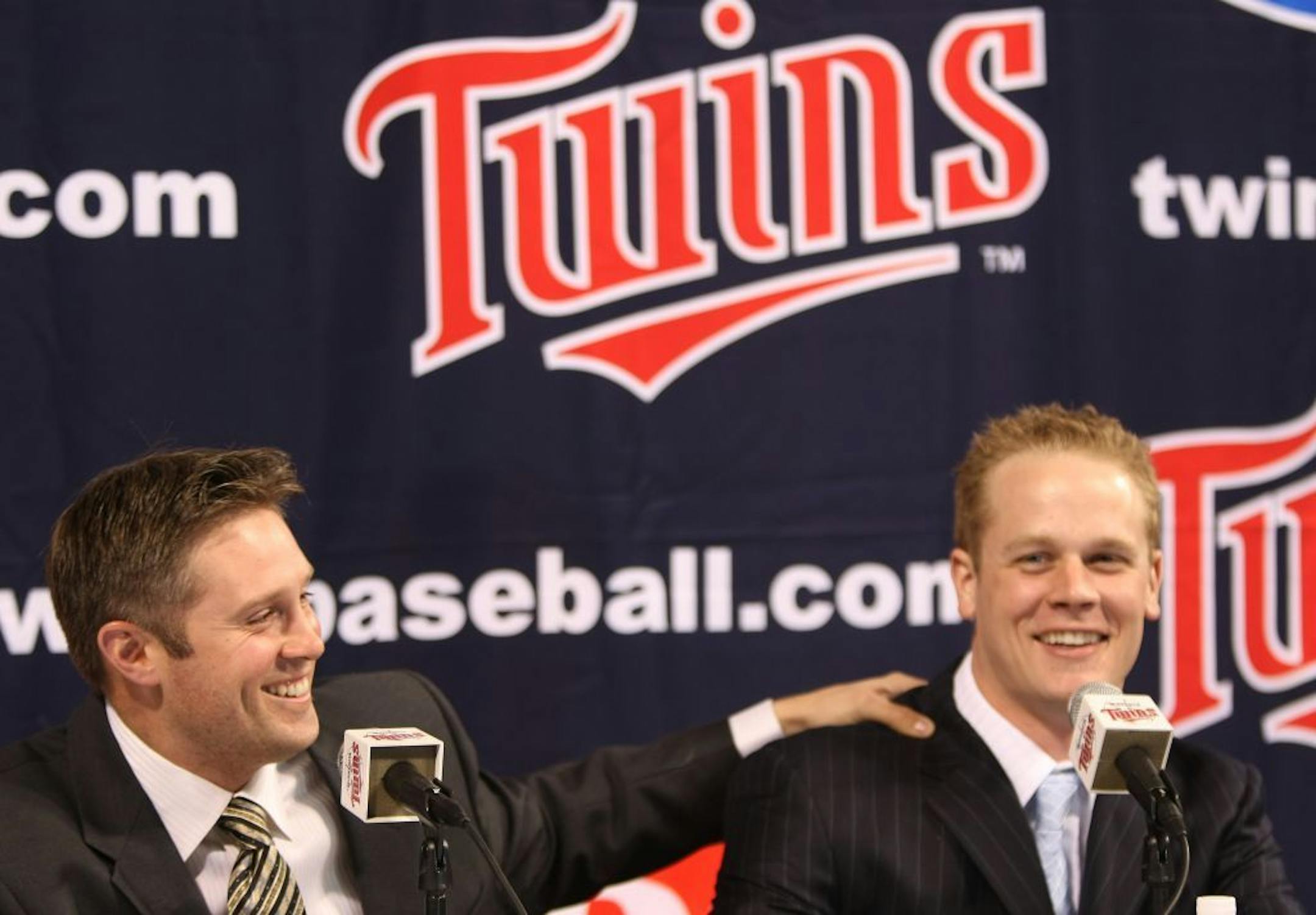 (left to right) Minnesota Twins Michael Cuddyer and Justin Morneau were all smiles as they talked about their new contracts at a press conference at the Twinsfest.