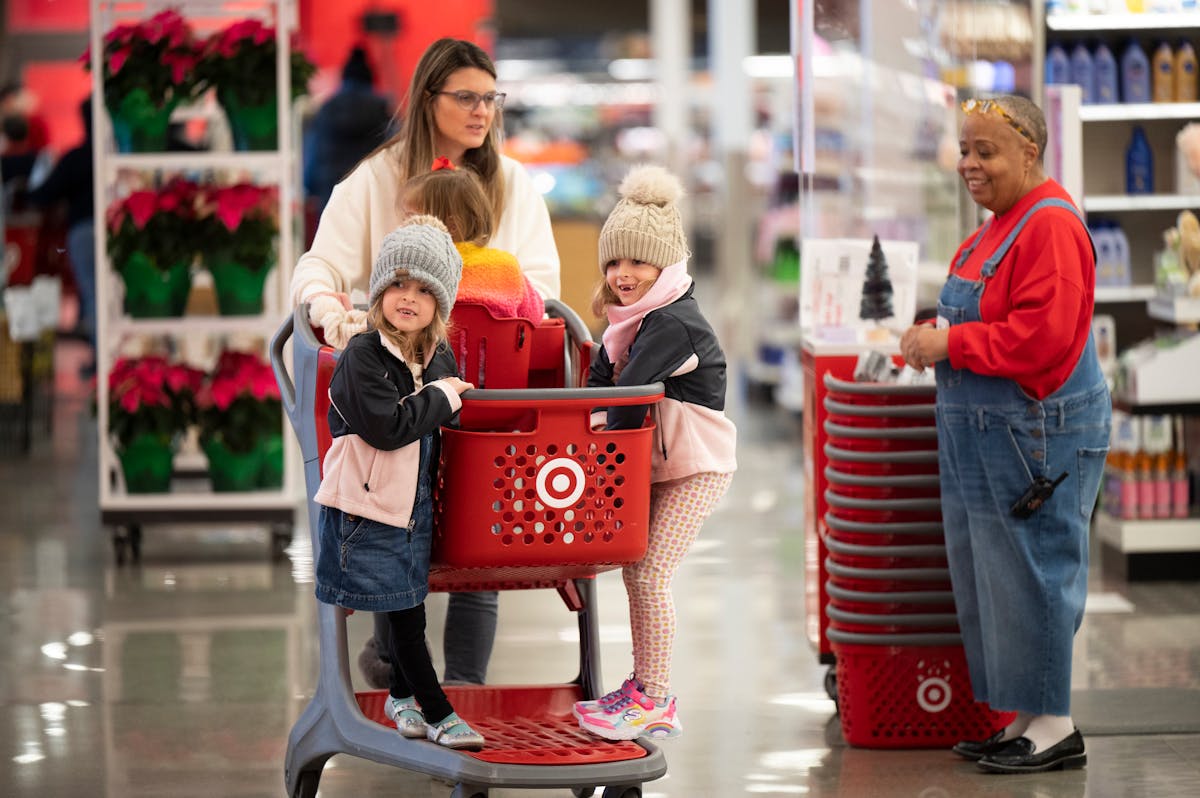 Heather Berman of Edina pushed a cart with her three daughters while Black Friday shopping at Target this past year.