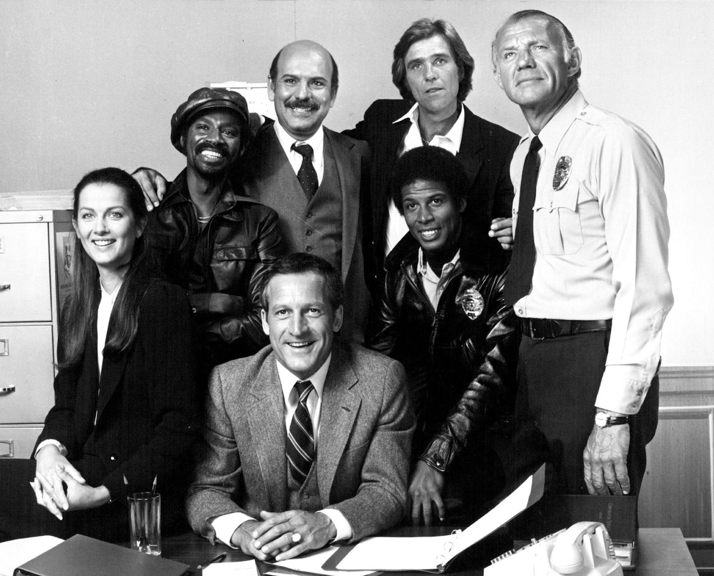 June 14, 1981 "Hill Street Blues" regulars surround Daniel J. Travanti, seated at center. Veronica Hamel, Taurean Blacque, Rene Enriquez, Kiel Martin, Michael Warren and Michael Conrad. NBC file ORG XMIT: MIN2014042310413285