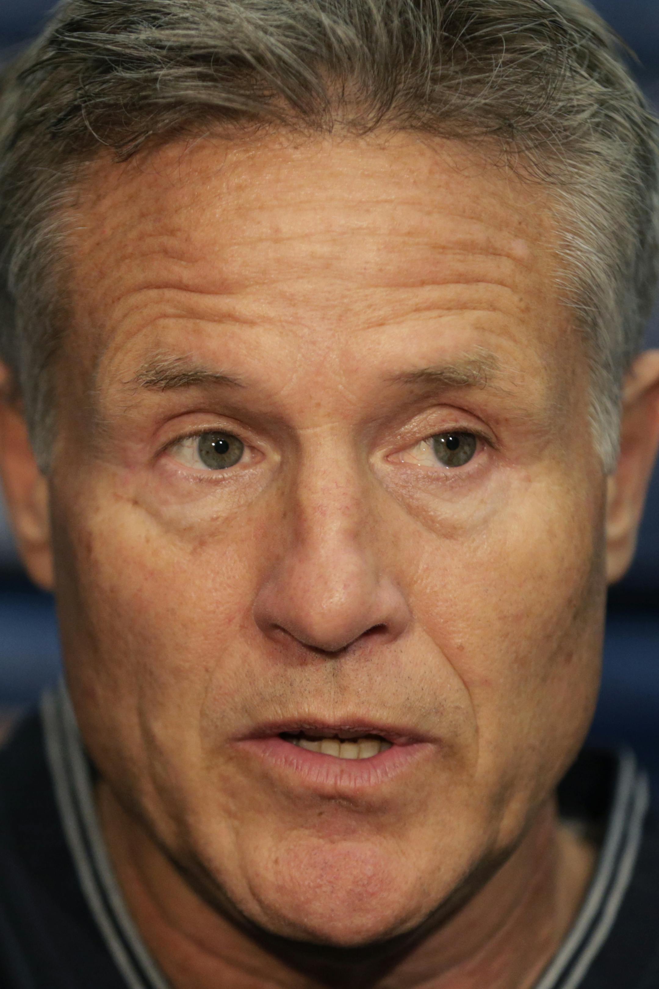 Philadelphia 76ers NBA basketball head coach Brett Brown talks to members of the press during training camp at Stockton College, Wednesday, Oct. 1, 2014, in Galloway, N.J. (AP Photo/Julio Cortez) ORG XMIT: NJJC109