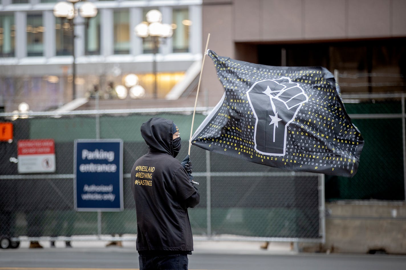 Chaz Neal protested outside the Hennepin County Government Center as jury selection continues in the trial against former Minneapolis police officer Derek Chauvin in the death of George Floyd, Monday, March 15, 2021 in Minneapolis, MN. (ELIZABETH FLORES/Minneapolis Star Tribune/TNS) ORG XMIT: 11161043W