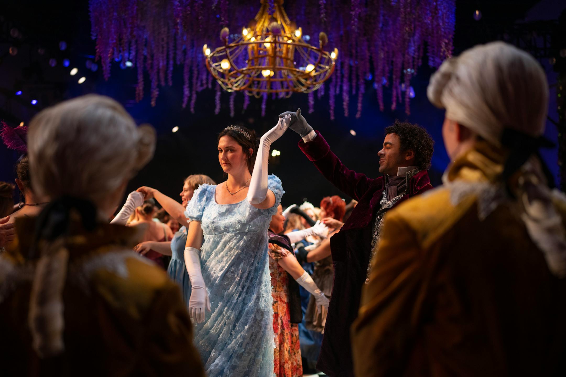 Carrera Walters danced with a cast member, Wilfred, on opening night of The Queen's Ball: A Bridgerton Experience.