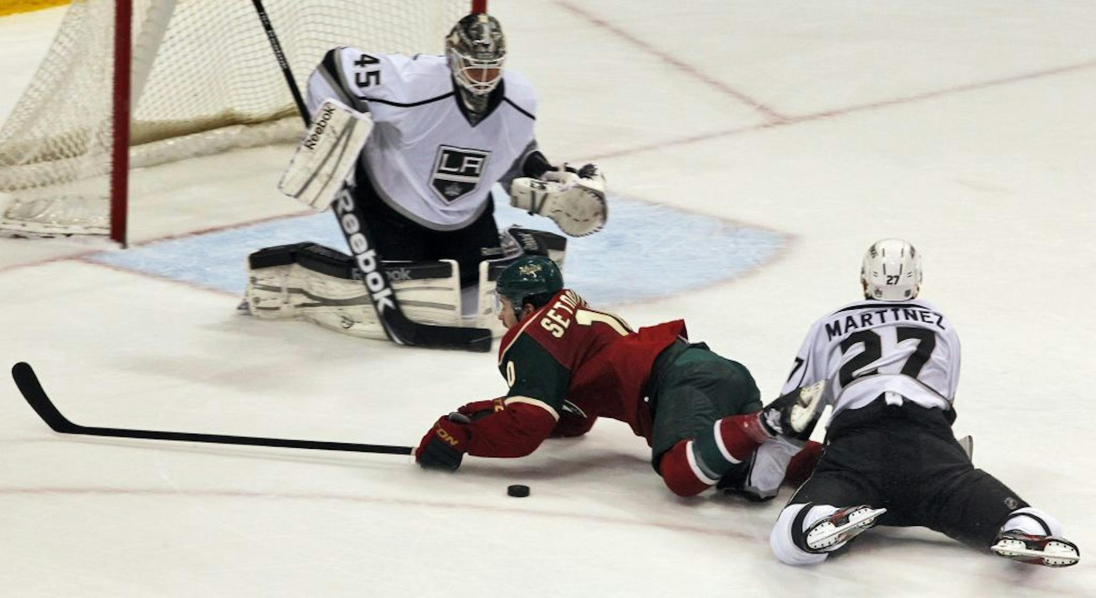 Wild's Devin Setoguchi was pulled down from behind by Kings Alec Martinez on a breakaway play. Setoguchi was awarded a penalty shot but was unable to score in the overtime period.