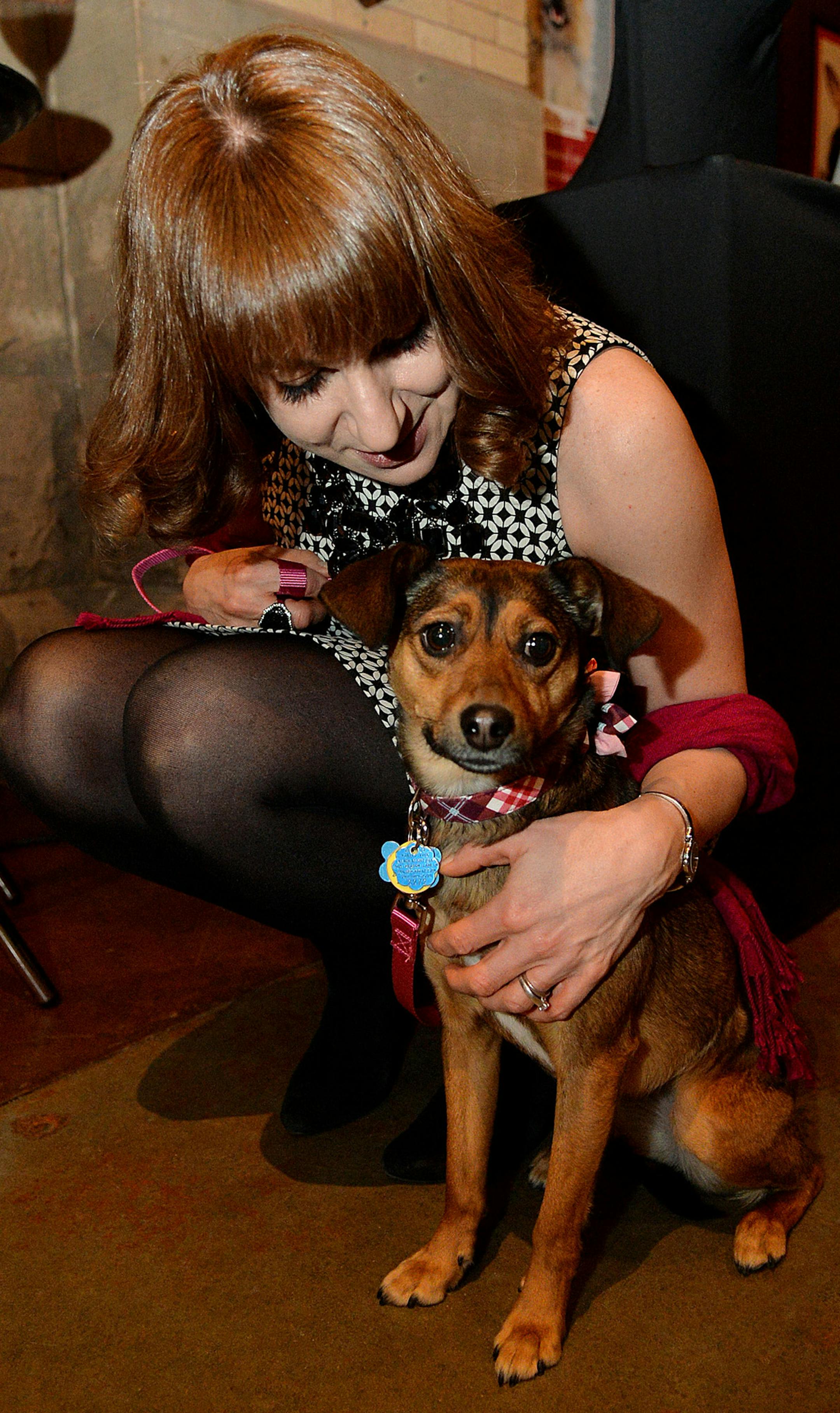 Shannon Toren and Lizzy, a terrier mix rescued from the Humane Society. ] (SPECIAL TO THE STAR TRIBUNE/BRE McGEE) **Shannon Toren, Lizzy (terrier mix)