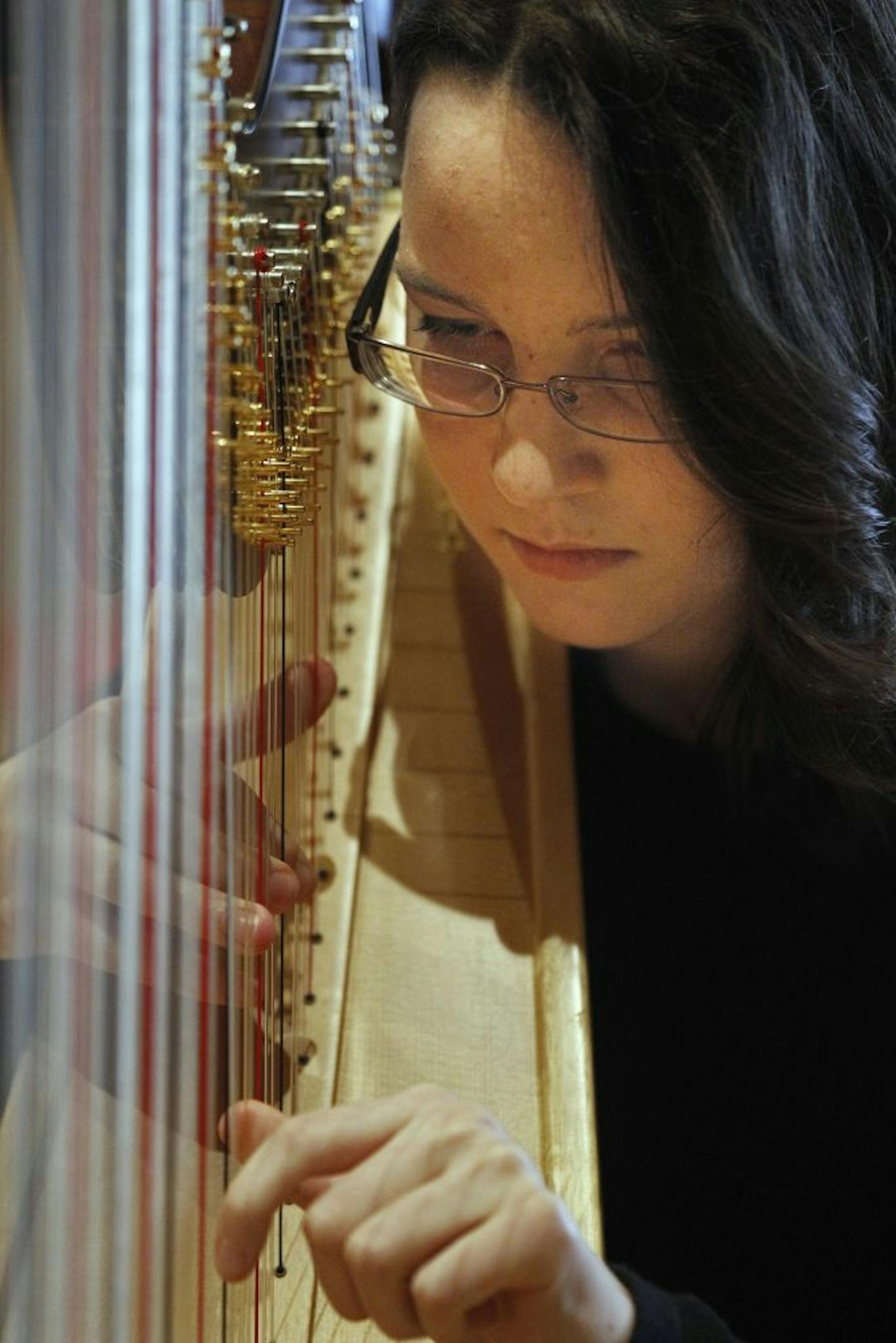 At Studio M at MPR, harpist Heather Cornelius performed a piece by Debussy for a recording .