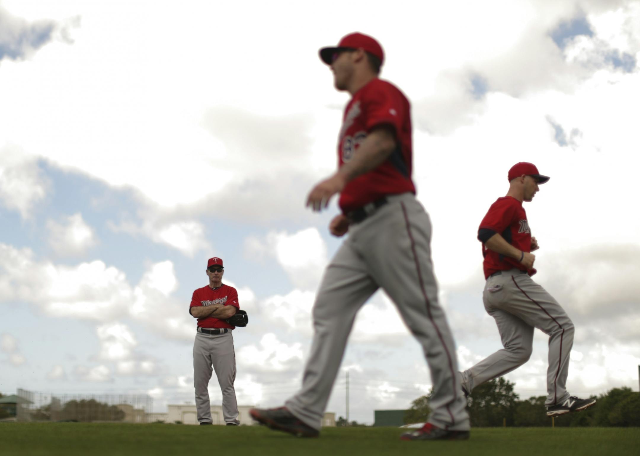 Twins manager Paul Molitor watched while catchers performed a base running drill Monday morning at Hammond Stadium.
