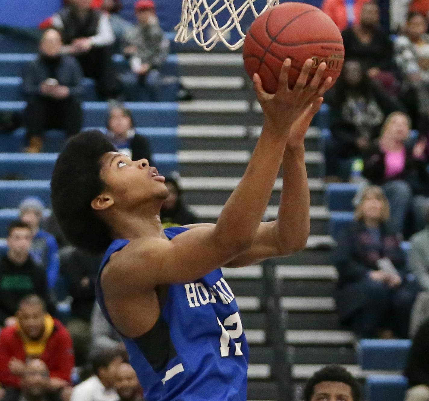 Kerwin Walton (12) of Hopkins goes up for basket against Minneapolis North. Minneapolis North vs. Hopkins 1/25/19 photos by Cheryl Myers