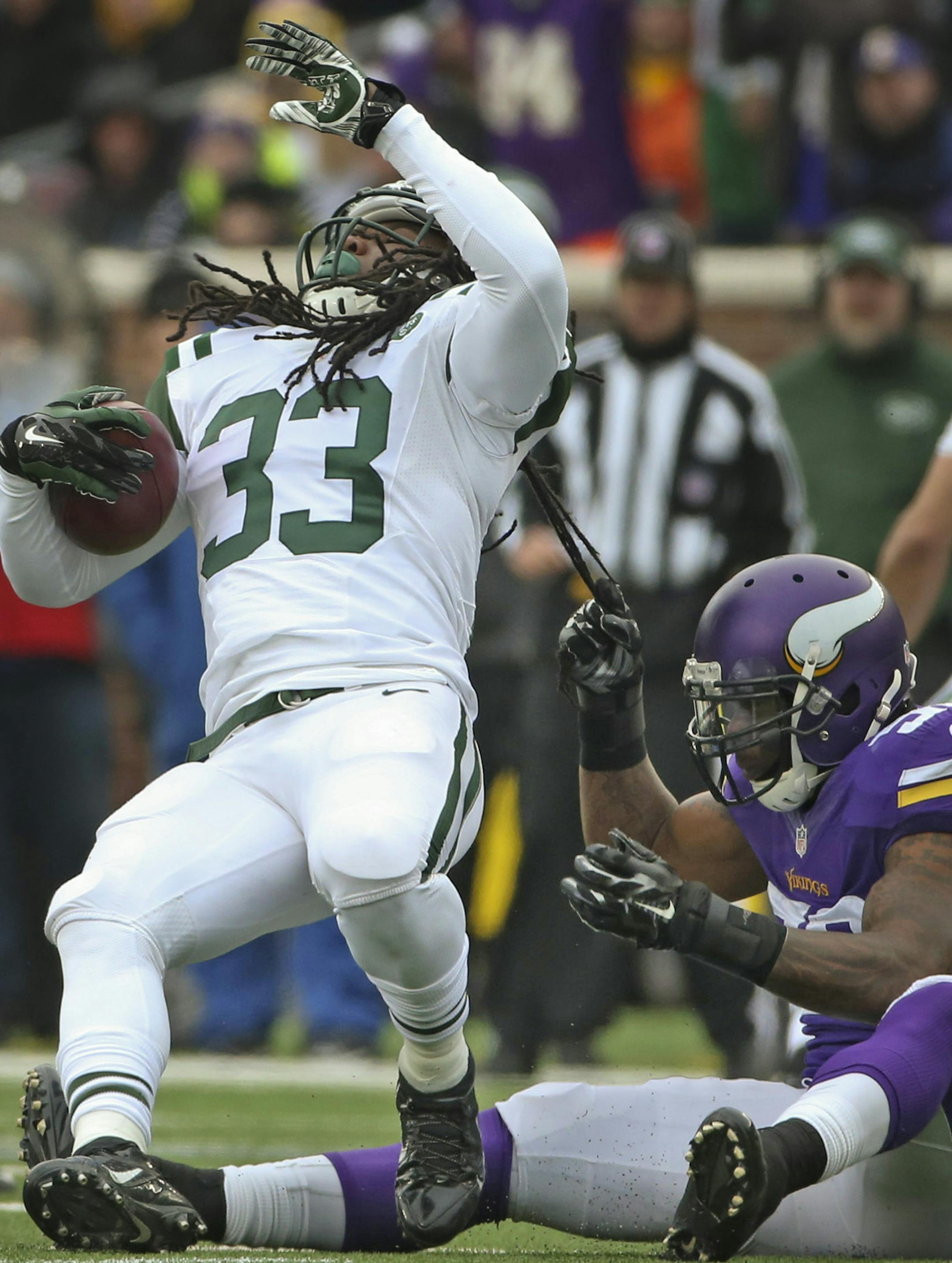 Minnesota Vikings outside linebacker Gerald Hodges (50) made a dreadlock tackle of New York Jets running back Chris Ivory (33) in the first quarter Sunday afternoon. ] JEFF WHEELER ‚Ä¢ jeff.wheeler@startribune.com The Minnesota Vikings beat the New York Jets 30-24 in overtime in an NFL football game Sunday afternoon, December 7, 2014 at TCF Bank Stadium in Minneapolis. ORG XMIT: MIN1412071648410034