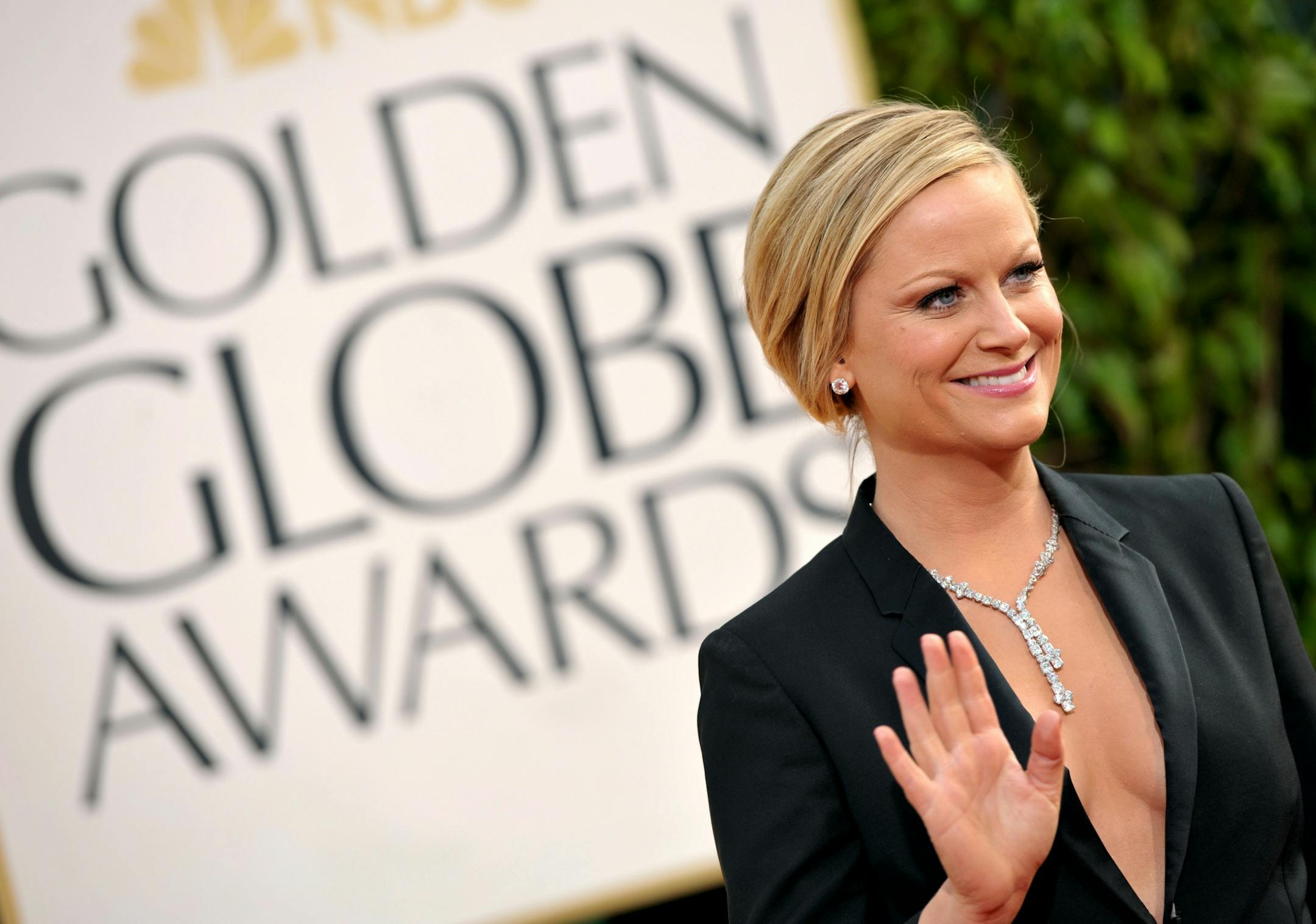 Amy Poehler arrives at the 70th Annual Golden Globe Awards at the Beverly Hilton Hotel on Sunday Jan. 13, 2013, in Beverly Hills, Calif.