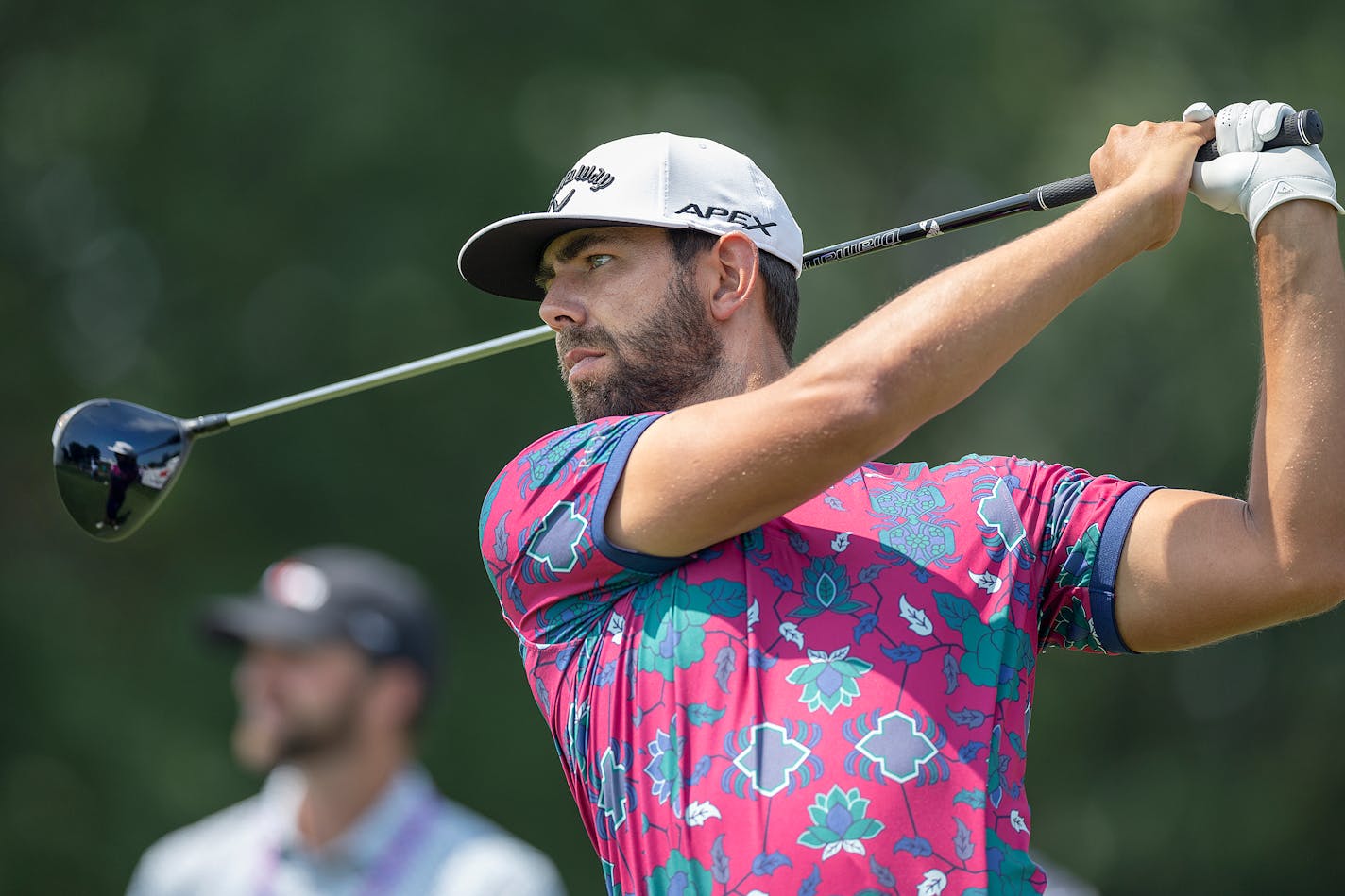 Golfer Erik van Rooyen tees at the 10th hole at the PGA Tour's 3M Open.