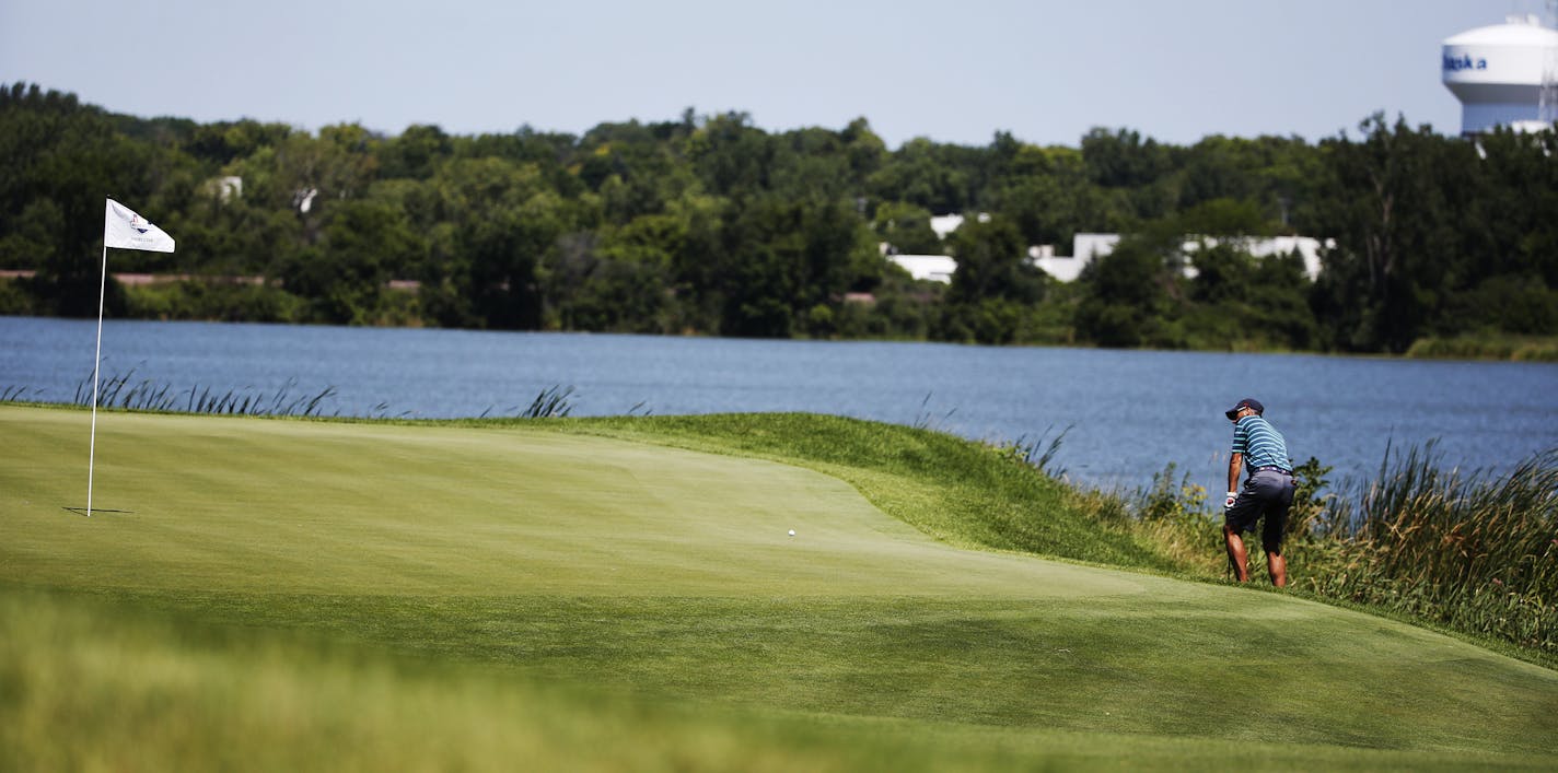 The signature 16th hole is one Davis Love will look over carefully . He captains the 2016 Ryder's Cup team. He received an honorary membership to the Hazeltine golf course which will host the event.] Richard Tsong-Taatarii/rtsong-taatarii@startribune.com ORG XMIT: MIN1507191558560697