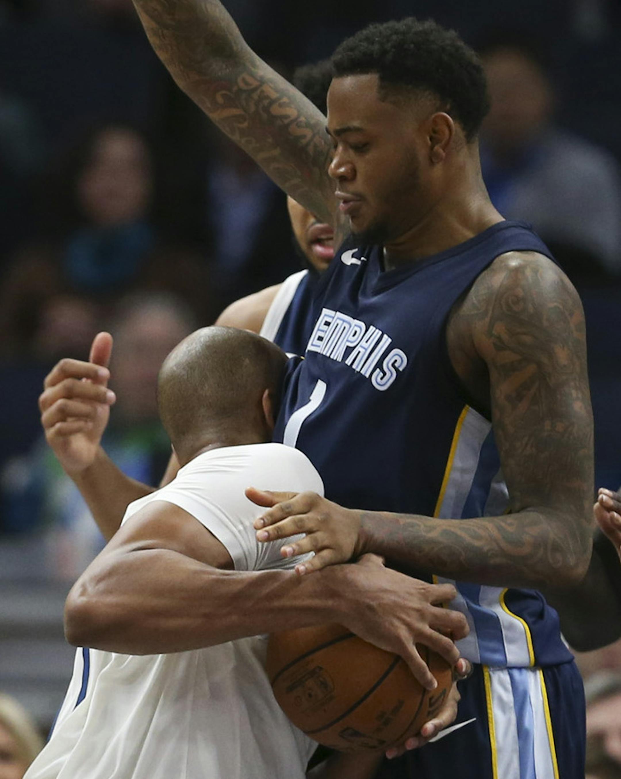 Minnesota Timberwolves forward Taj Gibson (67) drove into the chest of Grizzlies forward Jarell Martin (1) while driving to the net in the fourth quarter. ] JEFF WHEELER ï jeff.wheeler@startribune.com The Minnesota Timberwolves lost to the Memphis Grizzlies 101 - 93 in an NBA basketball game Monday night, March 26, 2018 at Target Center in Minneapolis.