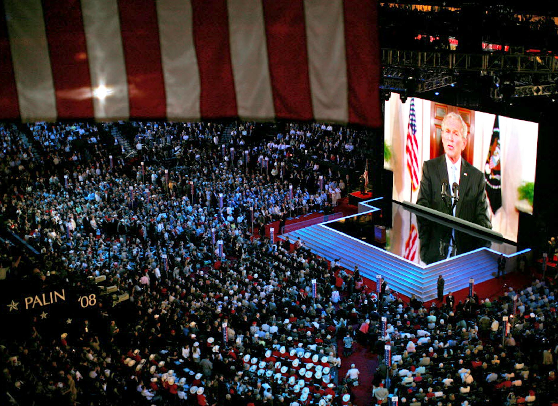 President Bush addressed the Republican National Convention via remote video and was introduced by his wife, Laura.