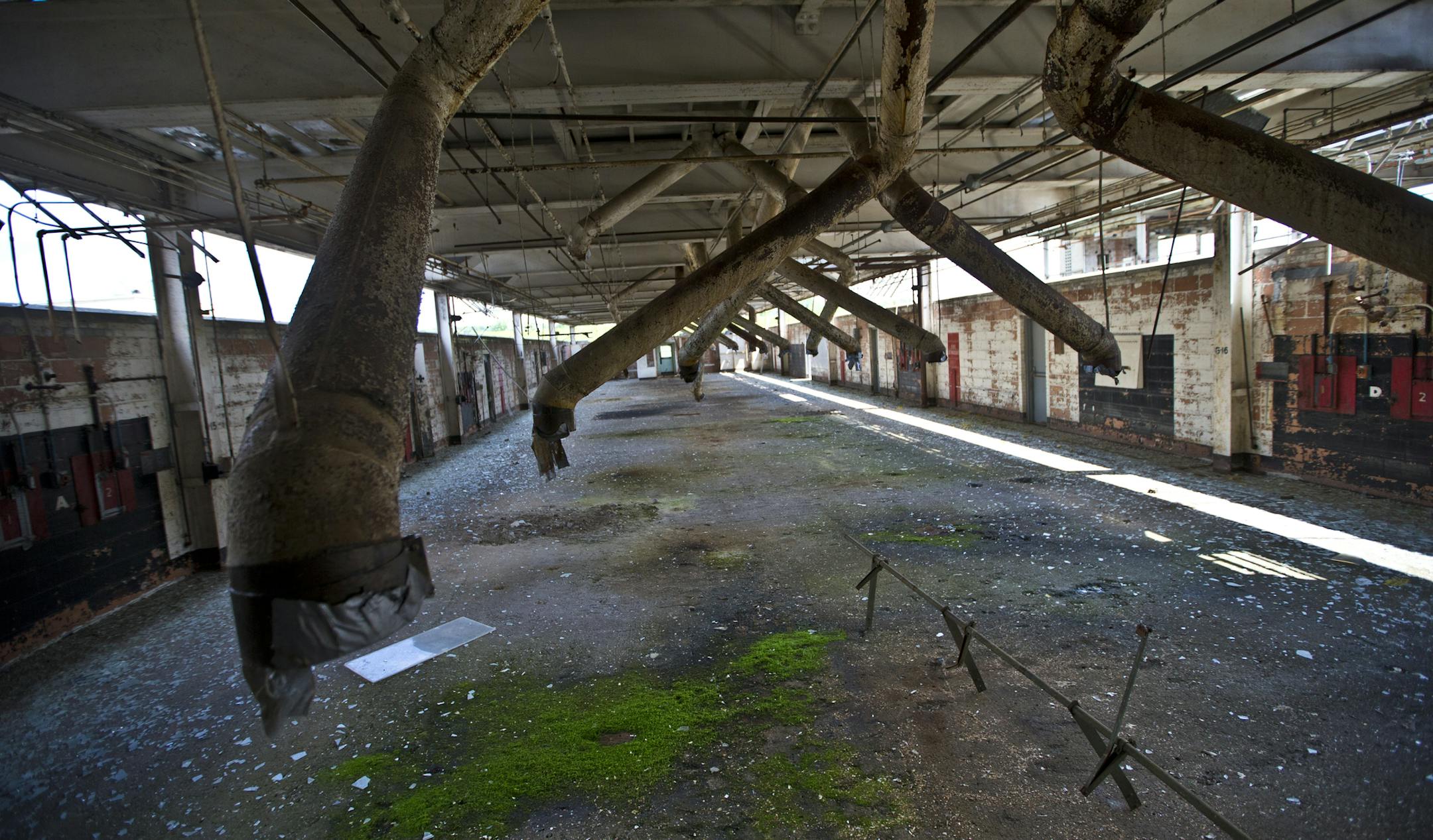 At the Twin Cities Army Ammunition Plant in Arden Hills, Building 101 housed the primer-insert room. Today, moss covers the floor in spots.