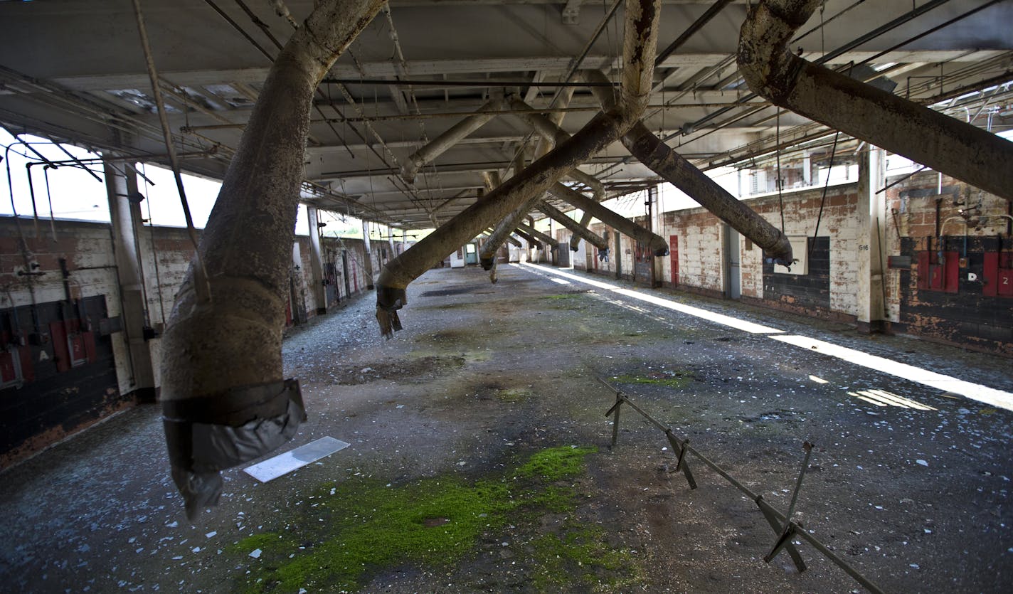 At the Twin Cities Army Ammunition Plant in Arden Hills, Building 101 housed the primer-insert room. Today, moss covers the floor in spots.