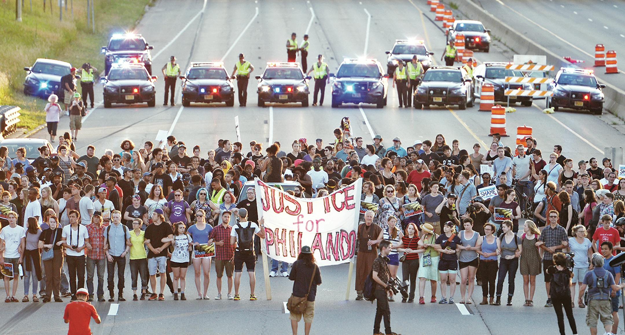 Marchers protesting the Wednesday night shooting death of Philando Castile by police have blocked part of Interstate 94 west of downtown St. Paul Saturday evening. Traffic was stacked in a thick logjam as early as 7 p.m., with the eastbound lanes mostly unmoving. About 7:30 p.m. Saturday, police and the State Patrol were diverting all traffic off eastbound I-94 at the Lexington Avenue exit, with scant traffic traveling in the opposite direction on westbound I-94. Marchers were refusing police or