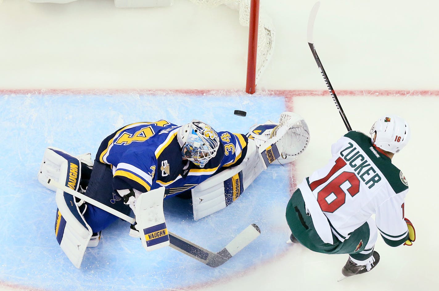 St. Louis Blues goaltender Jake Allen, left, stops a breakaway shot by the Minnesota Wild's Jason Zucker in the first period on Thursday, Oct. 13, 2016, at the Scottrade Center in St. Louis. The Blues won, 3-2. (Chris Lee/St. Louis Post-Dispatch/TNS)