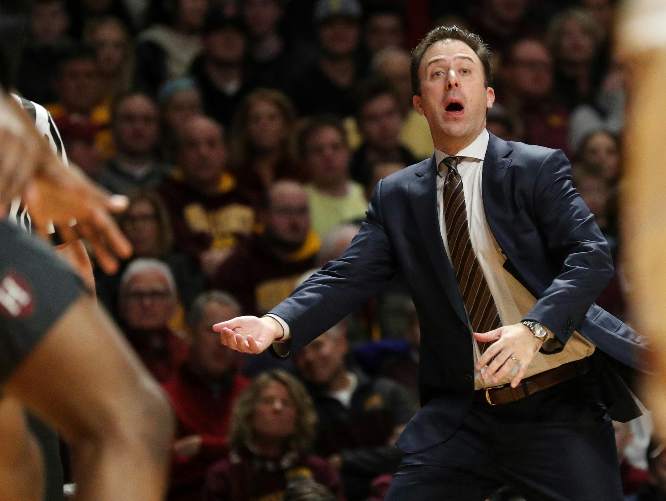 Minnesota Golden Gophers head coach Richard Pitino chased his players down the court from the sidelines in the first half. ] ANTHONY SOUFFLE ï anthony.souffle@startribune.com The Minnesota Golden Gophers played the Harvard Crimson in an NCAA basketball game Saturday, Dec. 30, 2017 at Williams Arena on the grounds of the University of Minnesota in Minneapolis.
