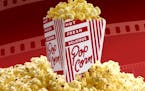 300 dpi 2 col. x 3.25 inches/108x83 mm/368x281 pixels Kurt Strazdins color illustration of a box of movie popcorn set in a mound of popcorn. KRT 2001