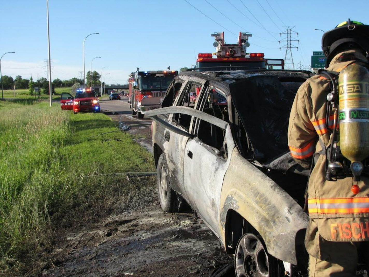 Robert Renning, of Woodbury, rescued a man from a burning vehicle after the car�s doors and power windows failed, Sunday, June 29, 2014.