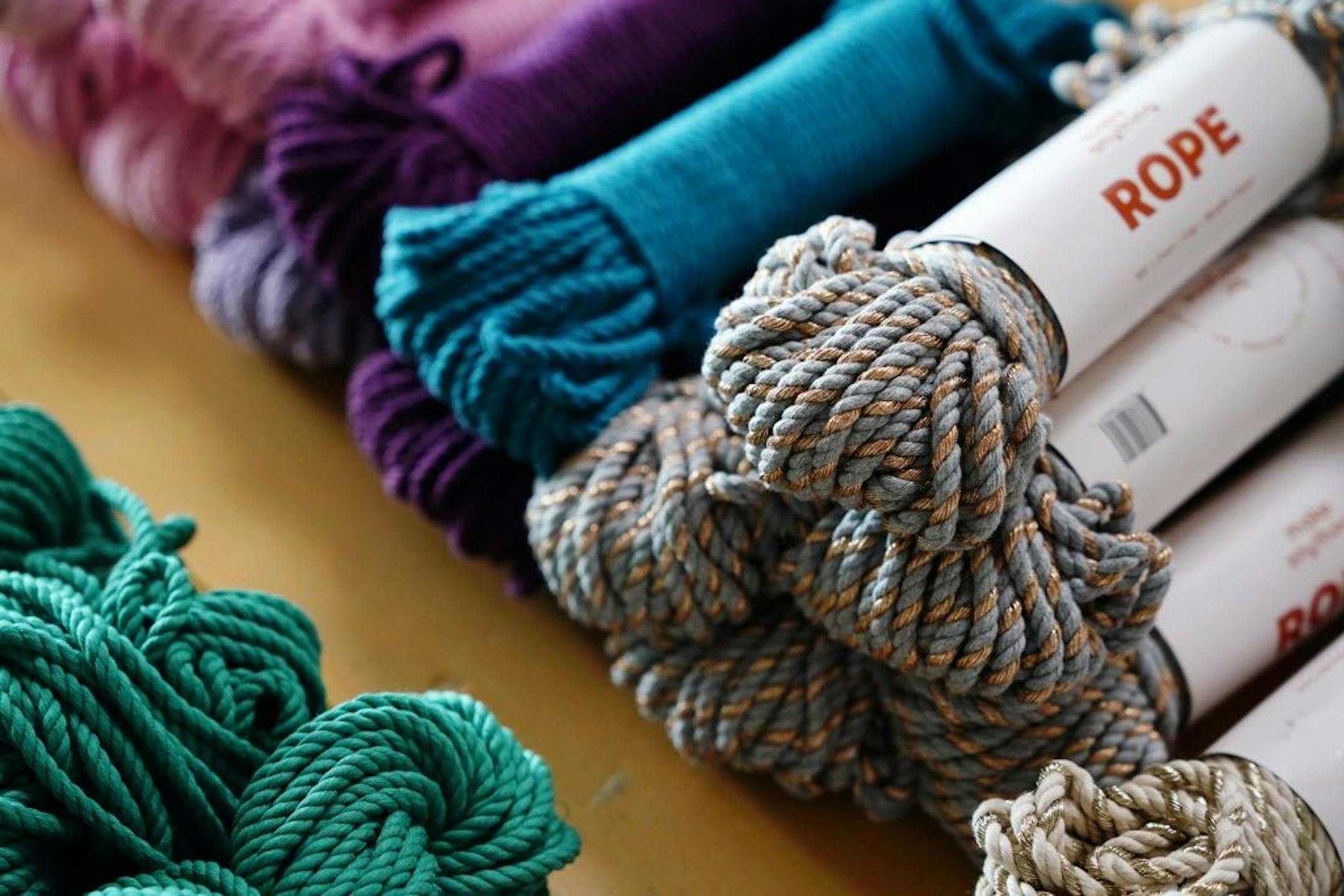 Rope and other supplies sat out for sale in Emily Katz's macrame class as students began to work on their own projects.