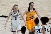 Paige Bueckers (5) played against Caitlin Clark (22) when UConn defeated Iowa 92-72 in the 2021 Sweet 16 in San Antonio.