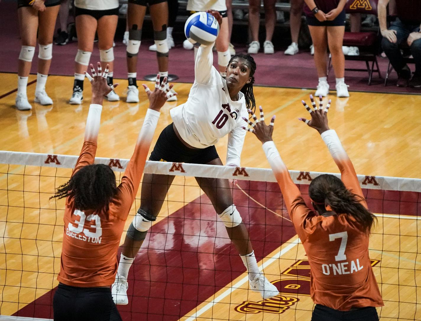 Minnesota Gophers Stephanie Samedy (10) spiked the ball for a point in the first set.