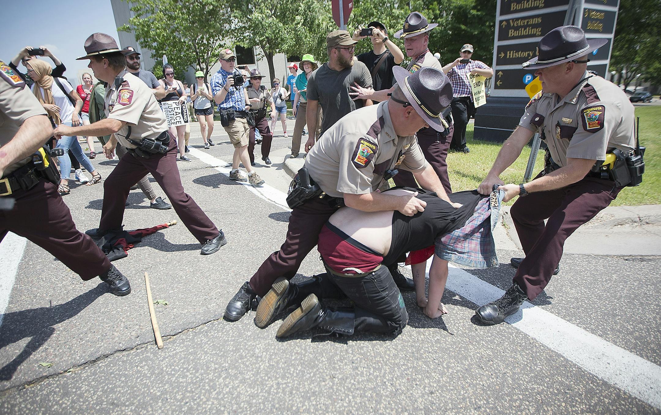 An anti-Sharia law group and antifascist protesters clashed during dueling rallies at the Minnesota State Capitol, Saturday, June 10, 2017 in St. Paul, MN. When a small faction of the anti-sharia group challenged the protesters outside, the Minnesota State Patrol had to intervene.