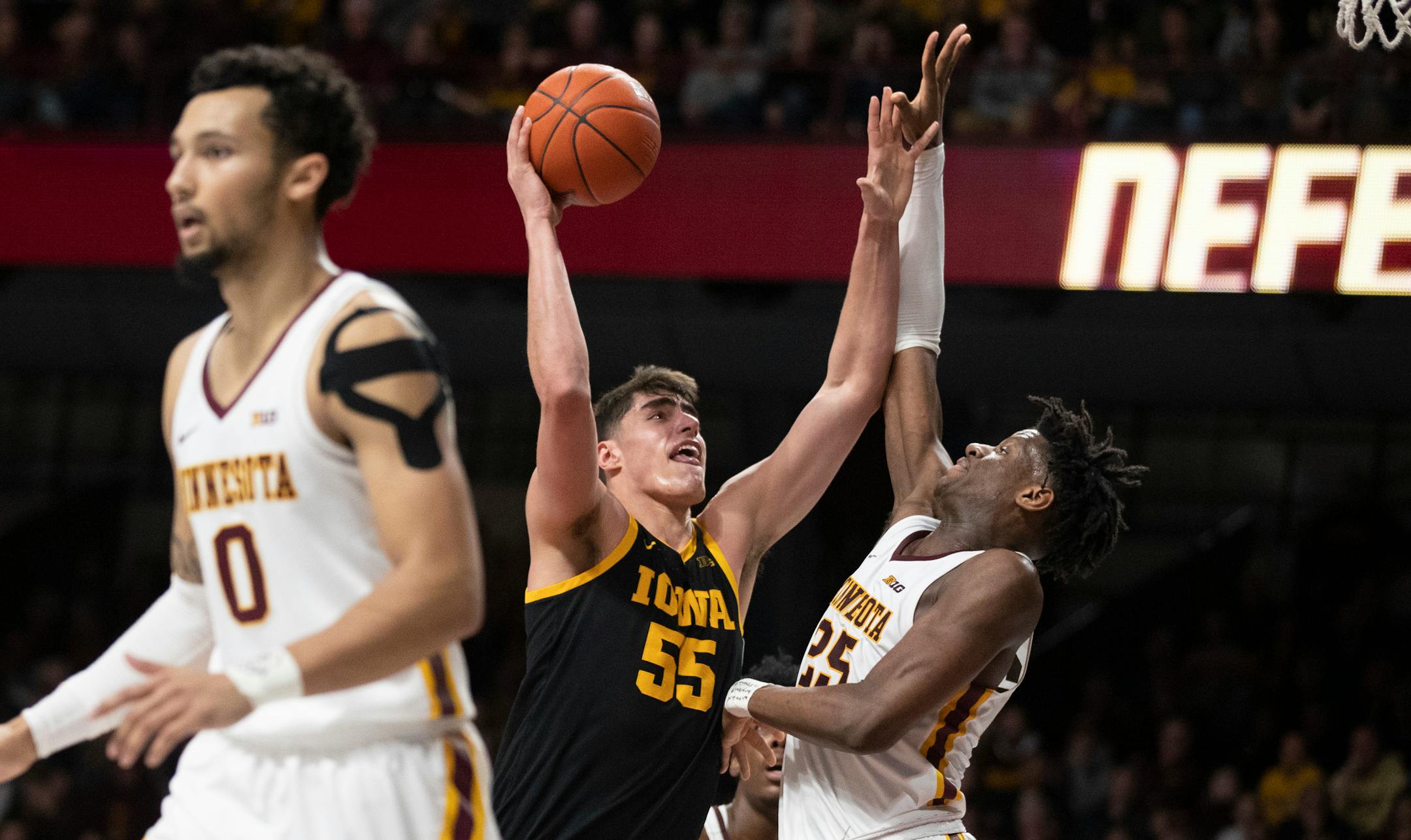 Iowa center Luka Garza scored over Gophers center Daniel Oturu in the second half.
