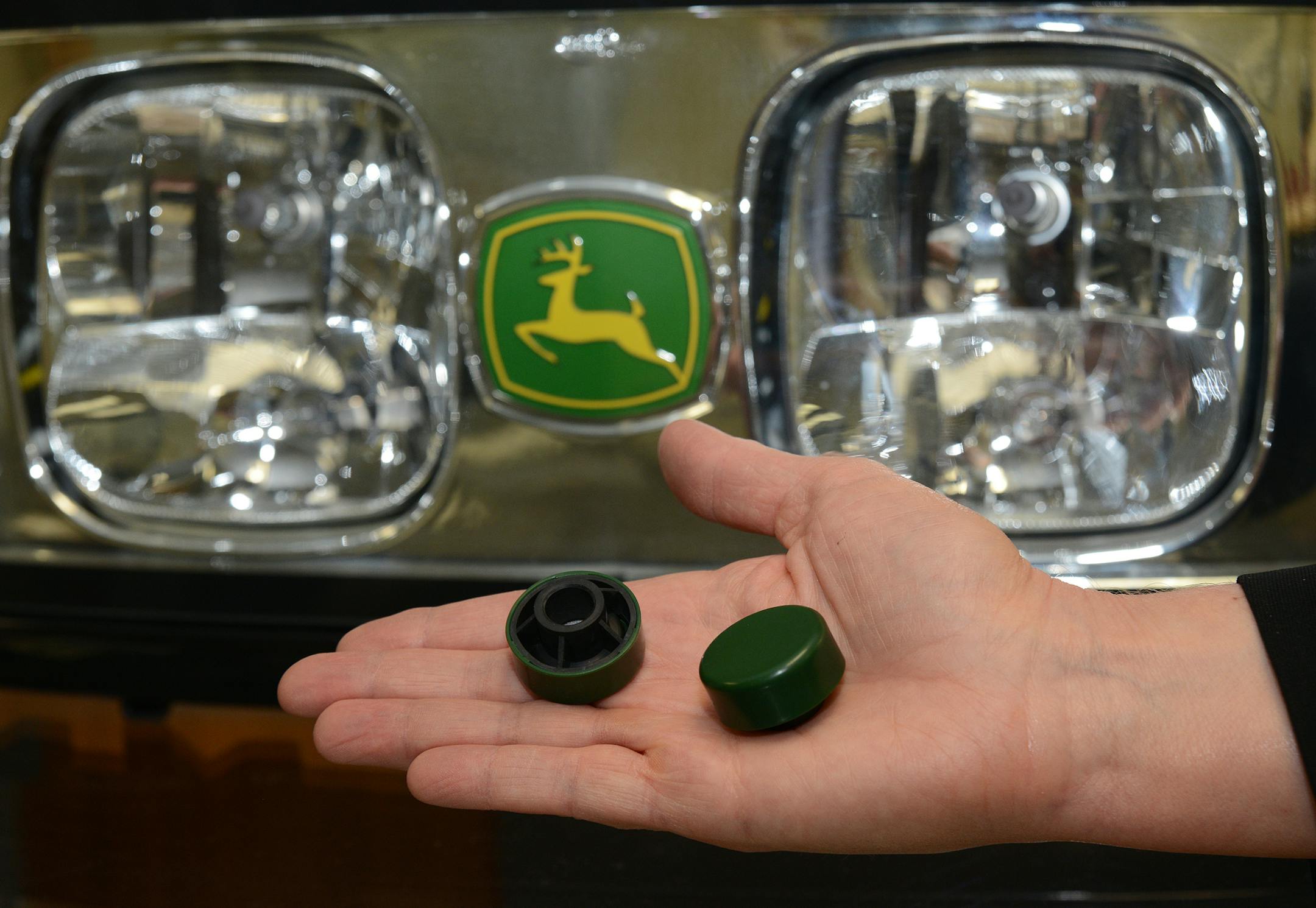 Vice President Peggy Herrmann of Donaldson Co. held several new products that use Donaldson filters that were adapted from its declining business of filters for disk drives inside PCs. These filters are used to cool halogen headlights in John Deere tractors] Richard.Sennott@startribune.com Richard Sennott/Star Tribune. , Bloomington Minn. Thursday 4/25/13) ** (cq)