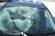 Large ice chunk flies off semi, smashes through car's windshield on I-694