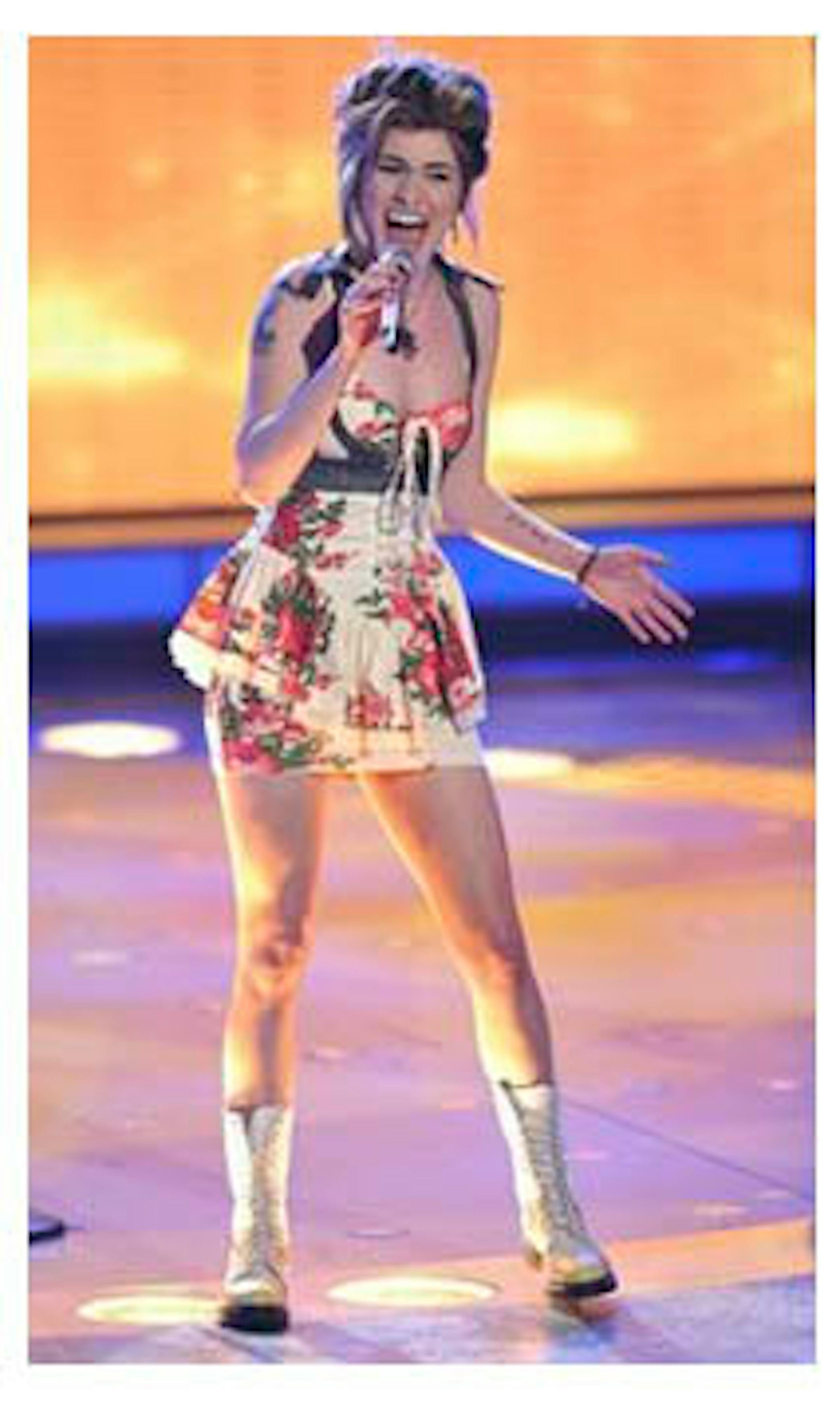 In this publicity image released by Fox, Siobhan Magnus performs on the singing competition series "American Idol," Tuesday, April 27, 2010 in Los Angeles.  (AP Photo/Fox, Michael Becker)