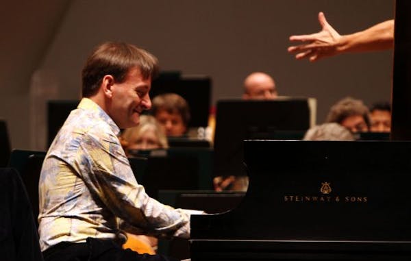 Pianist Stephen Hough in rehearsal with the Minnesota Orchestra on Tuesday afternoon. He plays here through Oct. 3.