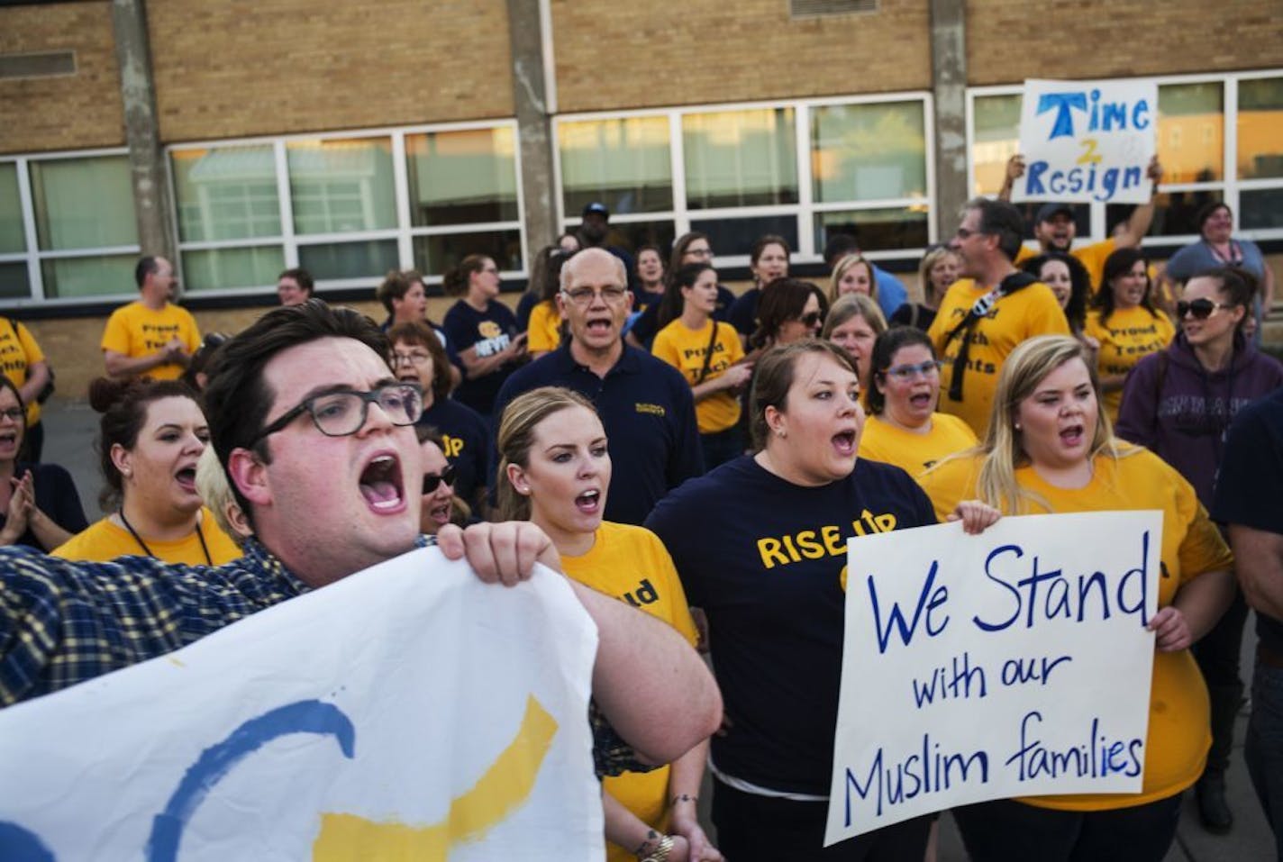 9/22/15 in Columbia Heights: Choir teacher Alex Jacques, far left, led teachers who called for