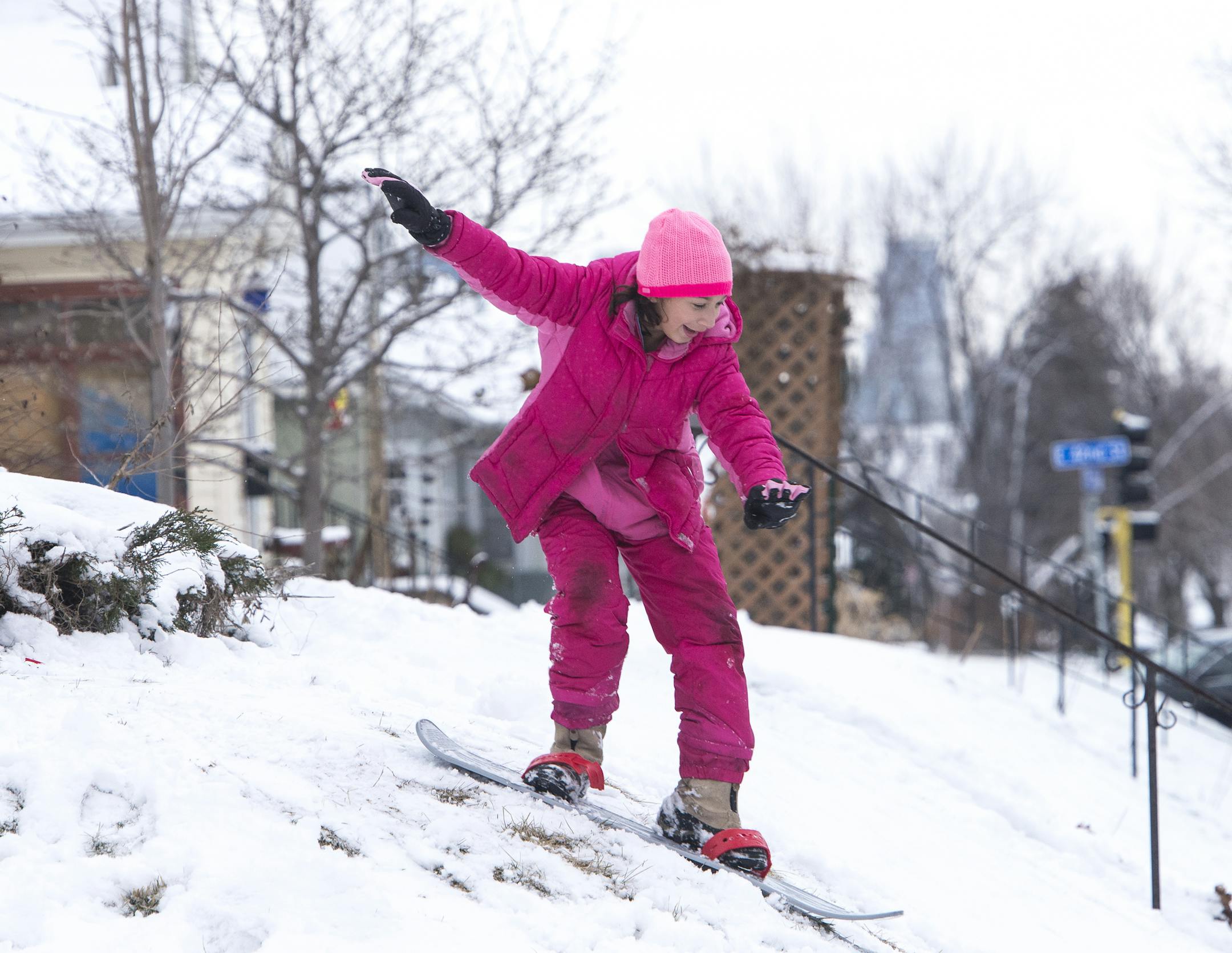 Shyla Longfield, 11, snowboarded down a hill near her home in the Field, Regina and Northrop area of Minneapolis on Saturday afternoon.