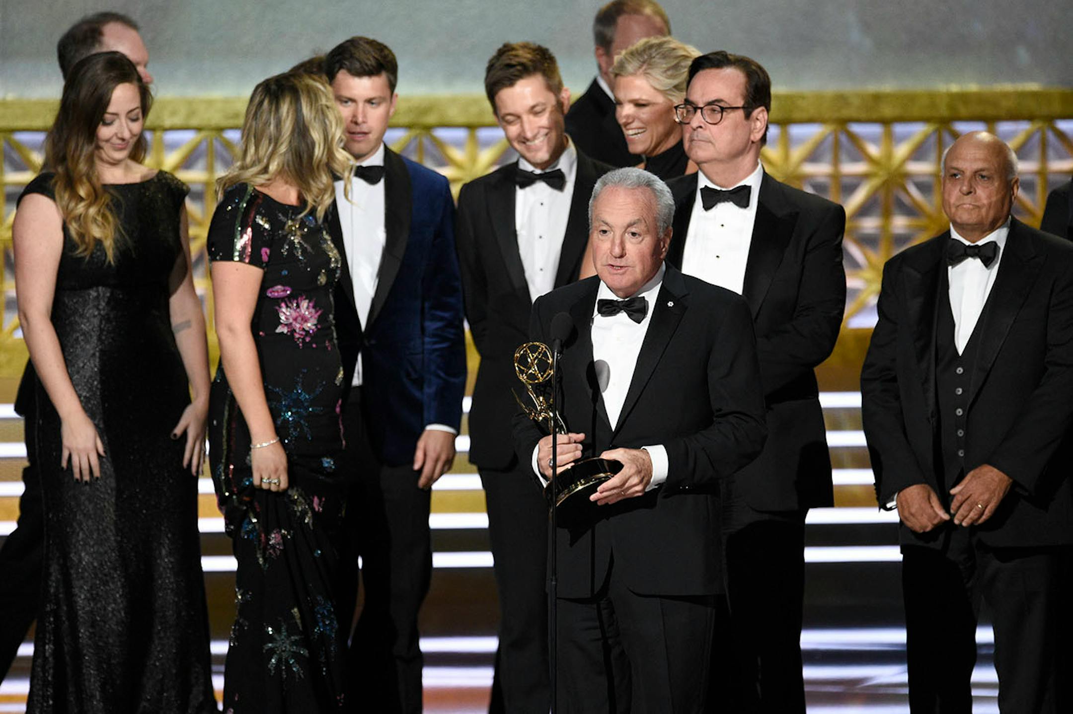 Lorne Michaels and the cast of SNL accept the award for outstanding variety sketch series for "Saturday Night Live" at the 69th Primetime Emmy Awards on Sunday, Sept. 17, 2017, at the Microsoft Theater in Los Angeles. (Photo by Chris Pizzello/Invision/AP)