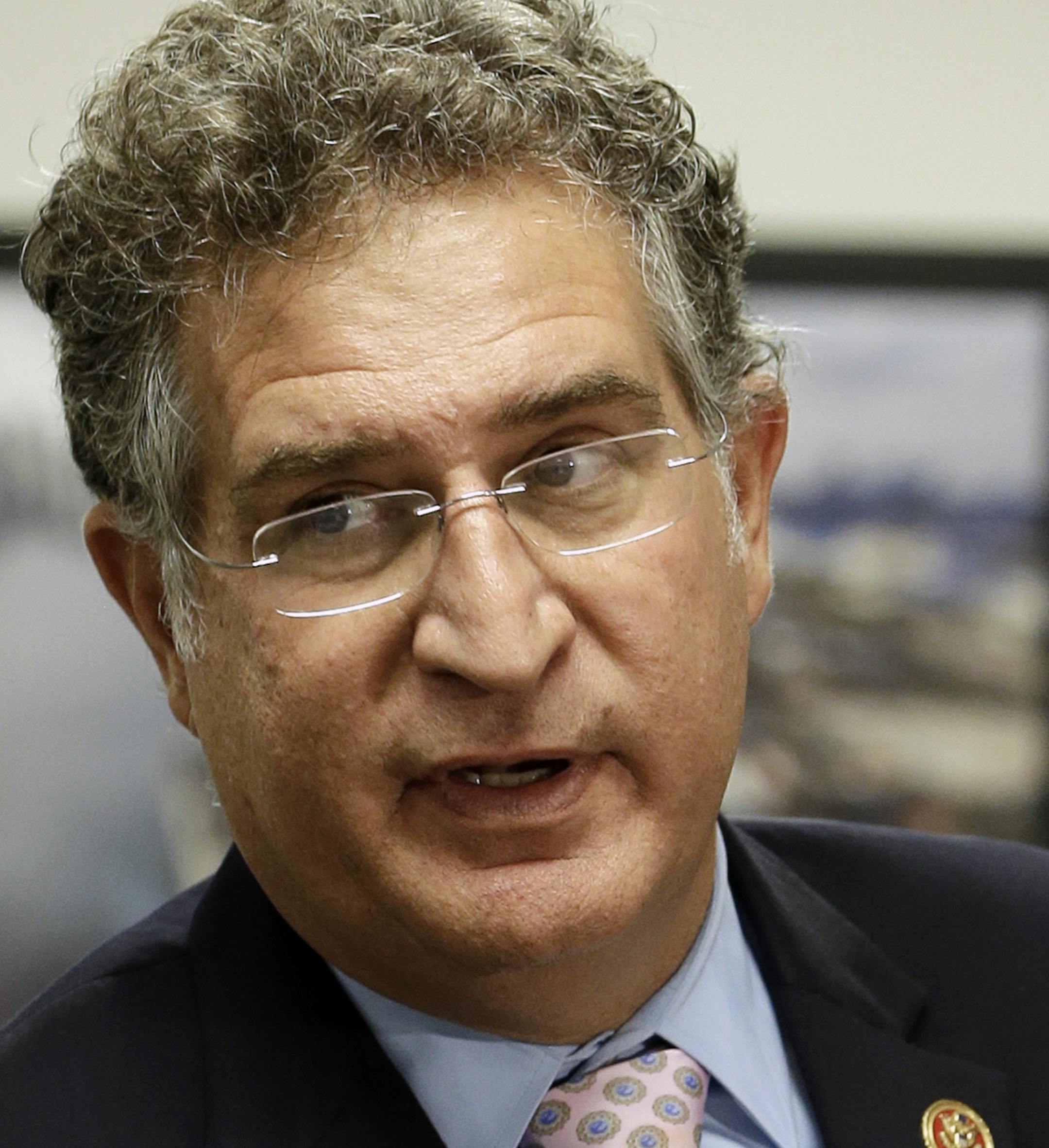 FILE- In this Oct. 9, 2014 file photo, Rep. Joe Garcia, D-Fla., visits Flagler Global Logistics in Miami. Garcia is trying to regain the seat he lost to Republican Carlos Curbelo in one of the nation's most competitive elections. Garcia is running against Democrat Annette Tadeo in the upcoming primary election. (AP Photo/Alan Diaz, File)