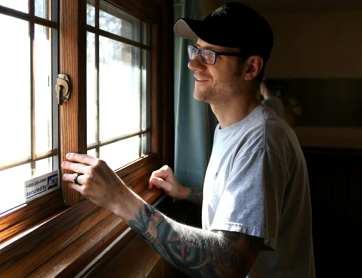 James Blekestad looked out the window of bedroom during an inspection of a house that they are buying on Eldorado Street Tuesday March 8, 2016 in Coon Rapids, MN. ] Jerry Holt/Jerry.Holt@Startribune.com