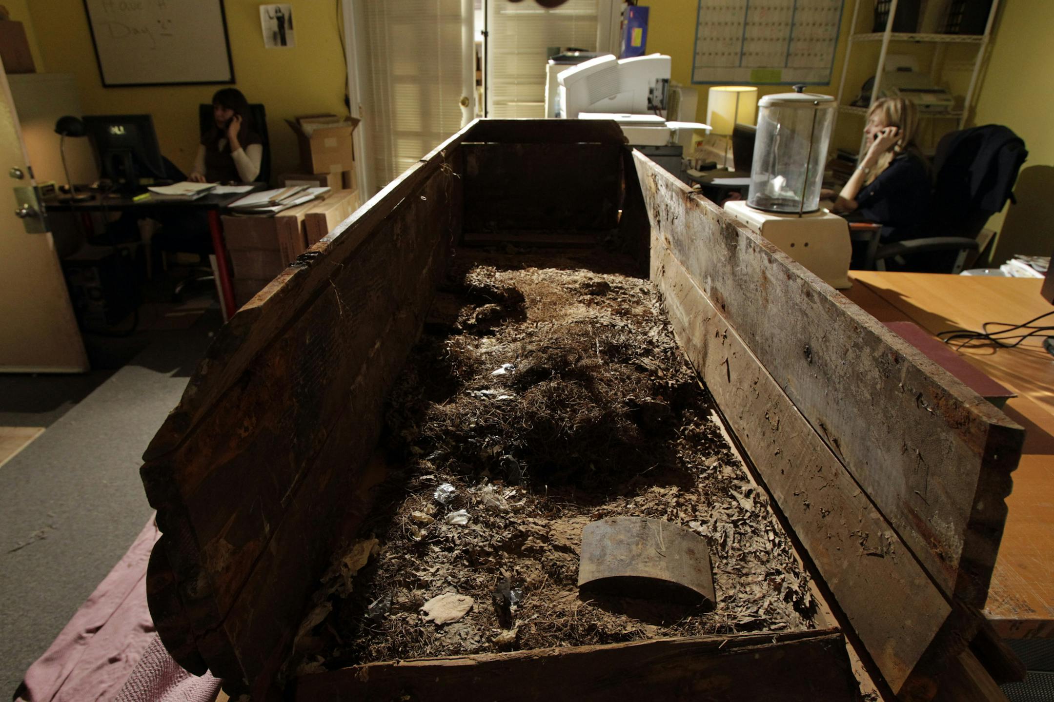 An wooden coffin in which John F. Kennedy's assassin Lee Harvey Oswald was buried is shown at Nate D. Sanders Auctions in Los Angeles, Wednesday, Dec. 1, 2010. The ghoulish piece of American history is now up for sale to the highest bidder. The coffin is being auctioned online by Texas mortuary owner Allen Baumgardner. (AP Photo/Jae C. Hong)