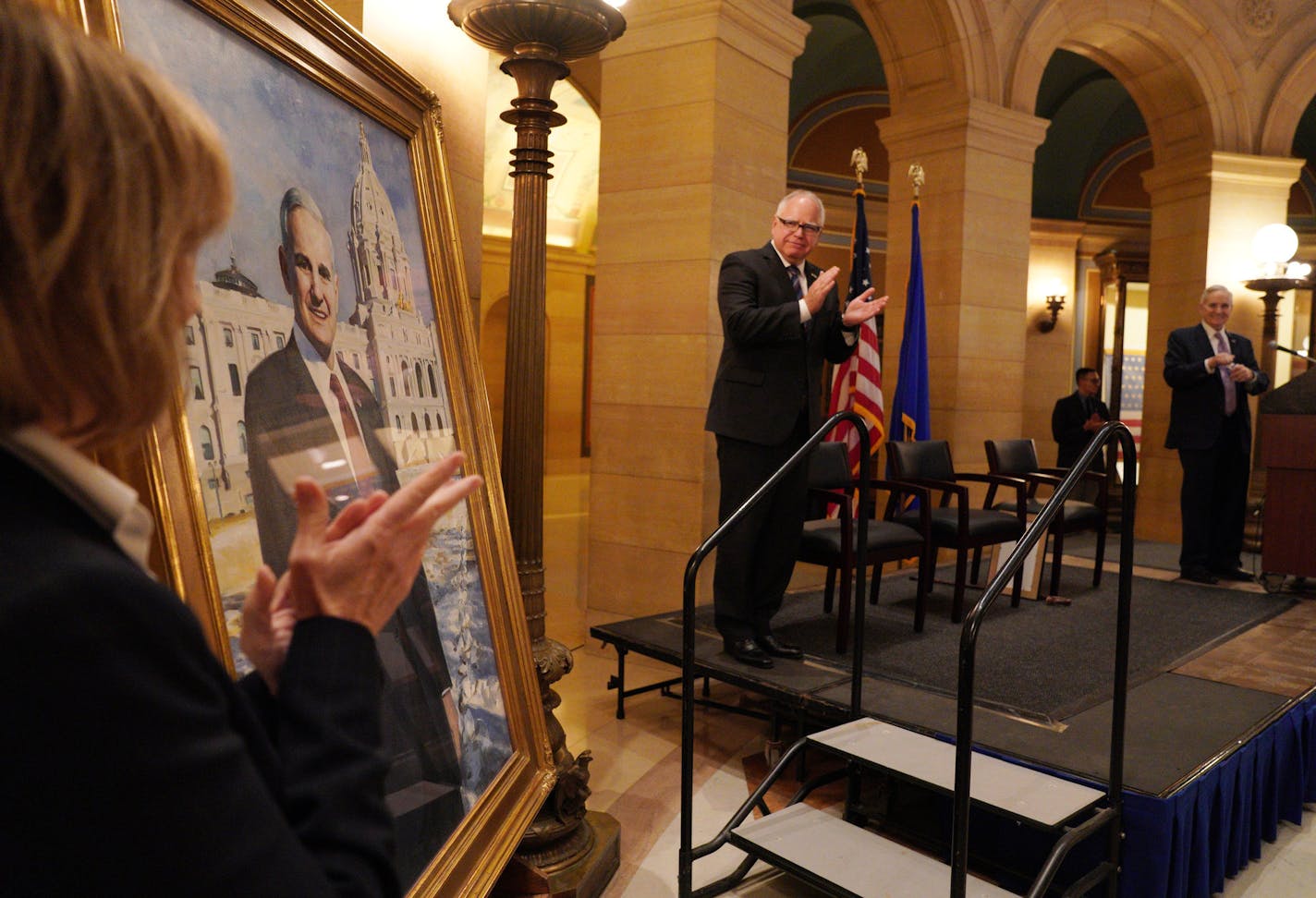 Sen. Tina Smith and Gov. Tim Walz applauded as former Gov. Mark Dayton's official Capitol portrait was unveiled during a ceremony Thursday. ] ANTHONY SOUFFLE &#x2022; anthony.souffle@startribune.com Former Minnesota Gov. Mark Dayton's official Capitol portrait was revealed during a ceremony Thursday, Oct. 17, 2019 at the Capitol Rotunda in St. Paul