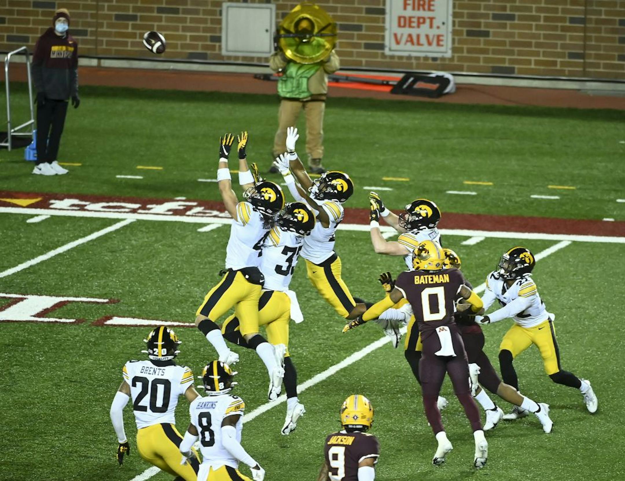 A host of Iowa defenders stopped a last-second pass to Minnesota Gophers wide receiver Rashod Bateman (0) and wide receiver Chris Autman-Bell (7) at the end of the second quarter.