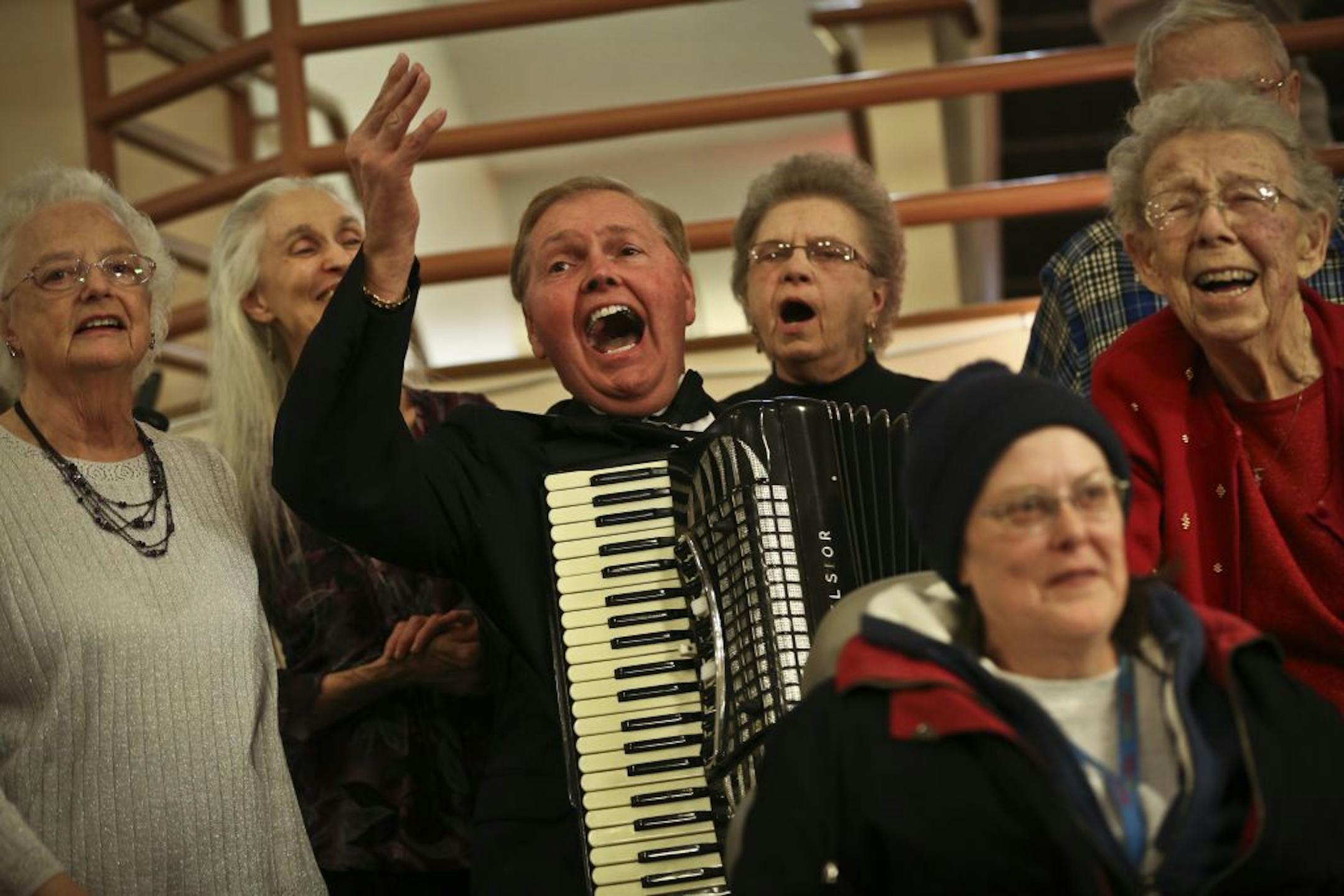 Leonard "Skeets" Langley, accordion player recently inducted in MN Music Hall of Fame, played for a group of residents as they sang along to a song at Copperfield Hill Senior Living in Robbinsdale, Minn., on Monday, December 31, 2012.