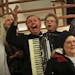 Leonard "Skeets" Langley, accordion player recently inducted in MN Music Hall of Fame, played for a group of residents as they sang along to a song at
