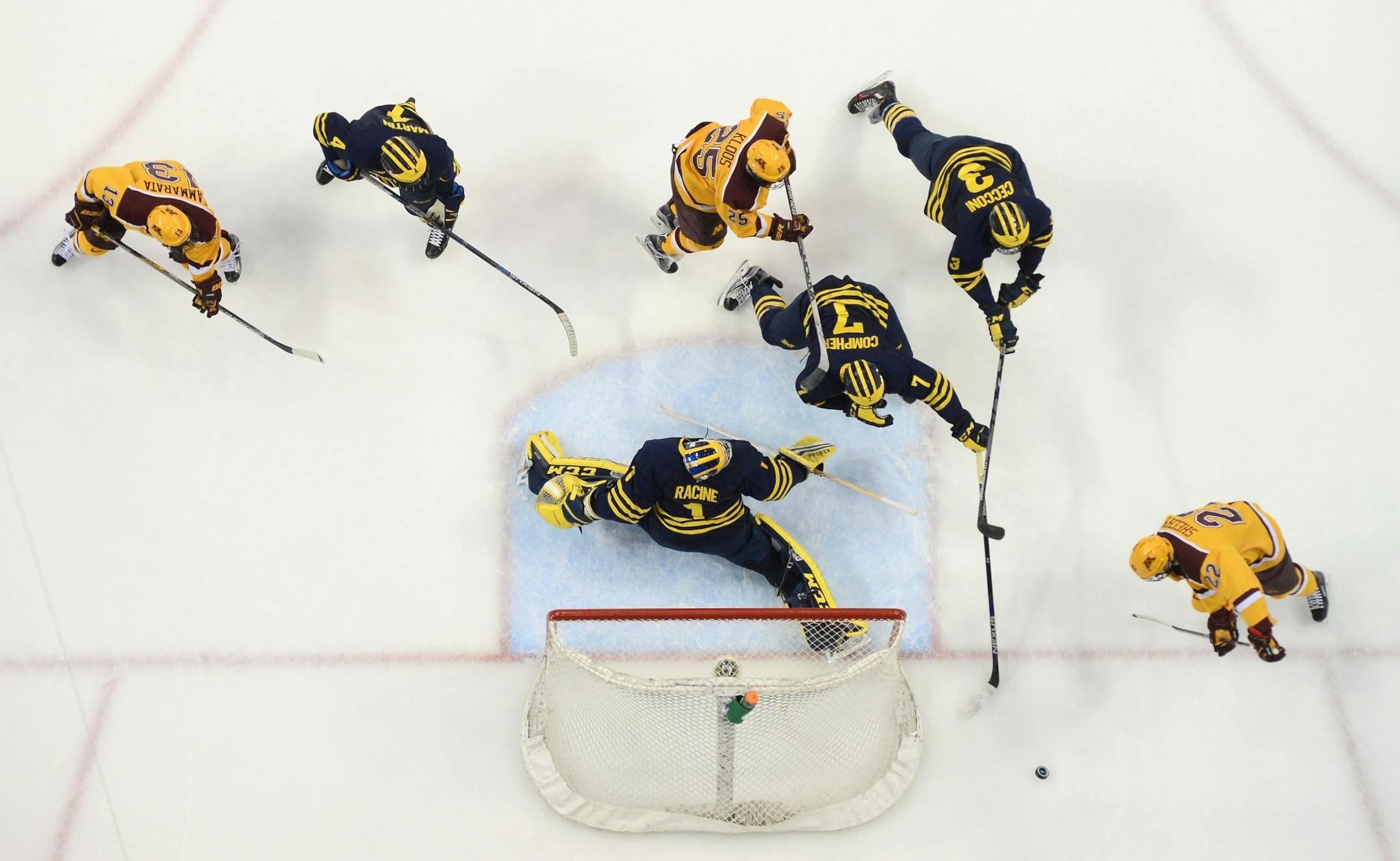 The Minnesota Golden Gophers were unable to score on Michigan Wolverines goalie Steve Racine (1) in the first period.
