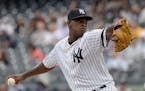 New York Yankees starting pitcher Luis Severino delivers the ball to the Minnesota Twins during the first inning of a baseball game Wednesday, Sept.20