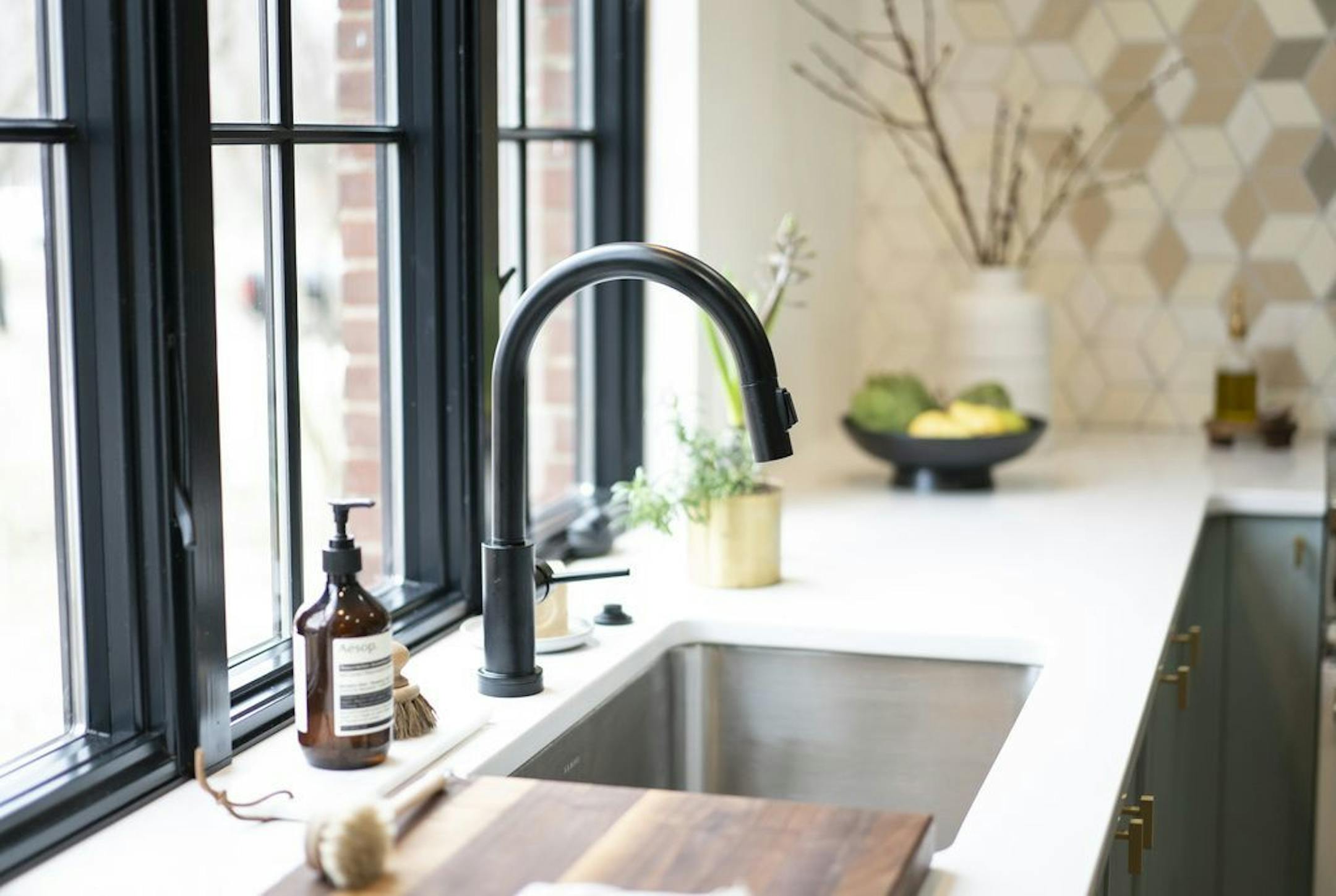 The new sink in front of the picture window.