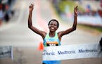 Jane Kibii won the women's division as she approached the finish line at the Capitol during theTwins Cities Marathon Sunday October 1,2017 in St. Paul