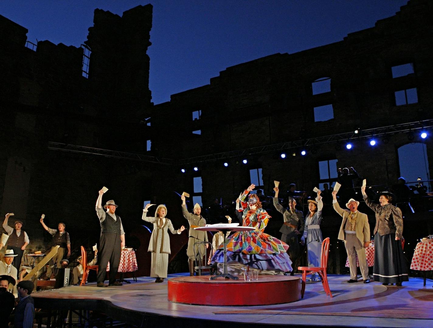 Photo by Michal Daniel Jill Gardner as Nedda and the Ensemble in the Mill City Summer Opera's production of Pagliacci at the Mill City Ruins. By Ruggiero Leoncavallo Pagliacci Creative Team: Stage Director - David Lefkowich Guest Conductor - Joseph Mechavich Scenic Designer - Narelle Sissons Costume Designer - Jennifer Caprio Lighting Designer - Steve TenEyck The Cast Canio - Richard Crawley Nedda - Jill Gardner Tonio - Andrew Wilkowske Silvio - Markus Beam Beppe - Eric Morris