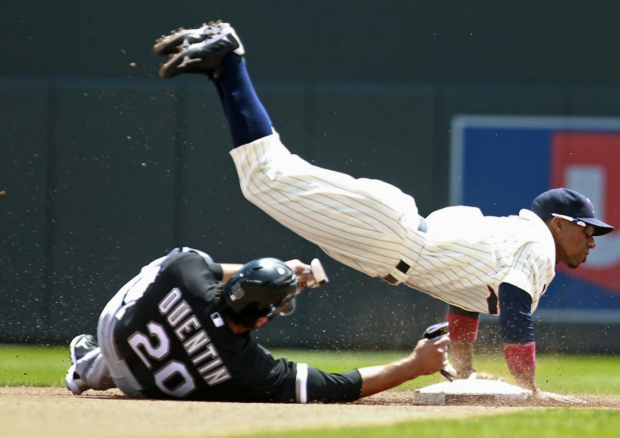 Minnesota Twins Alexi Casilla made the double play in the fourth inning as Carlos Quentin slid beneath him.