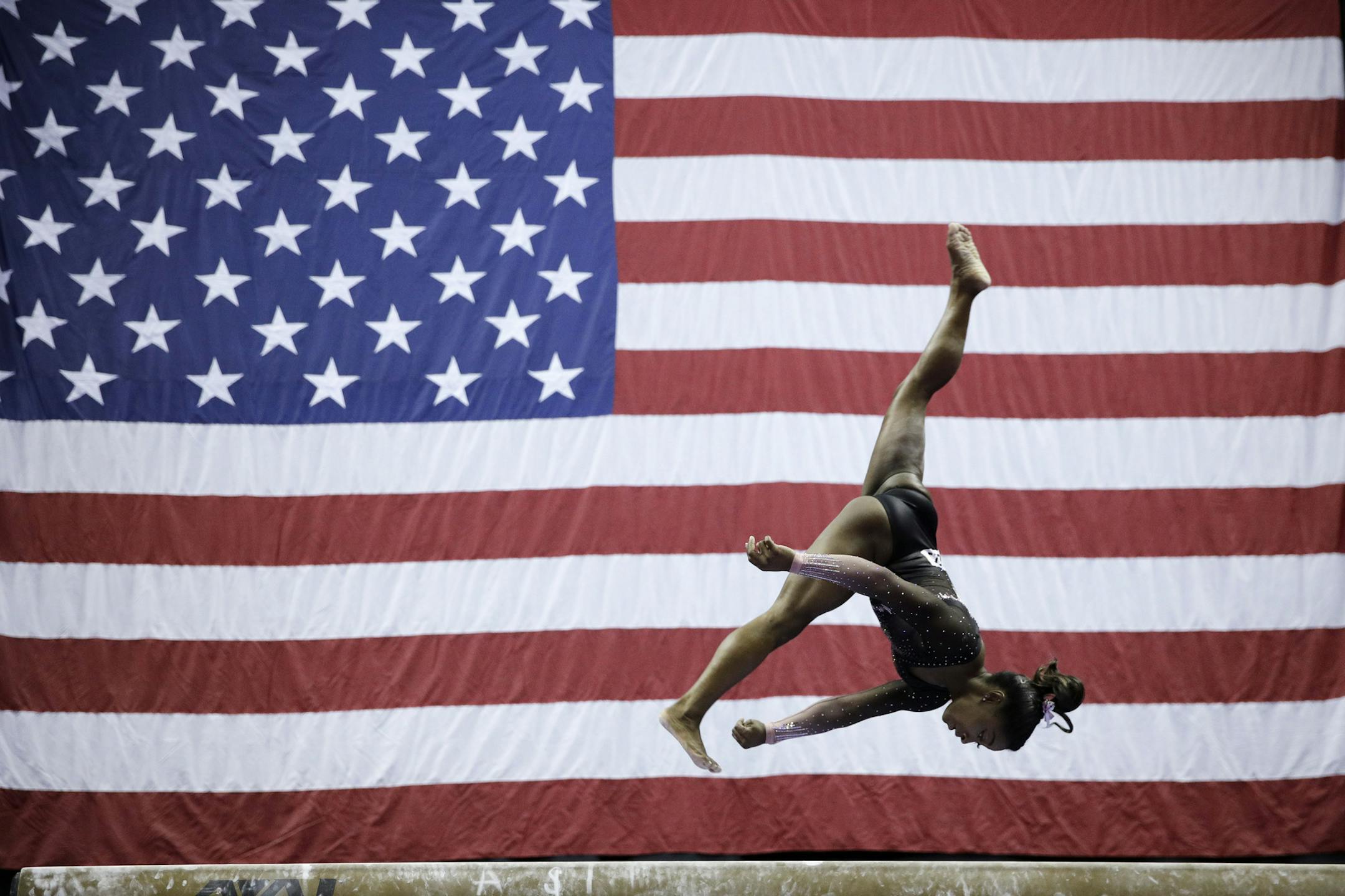 Simone Biles competes in the beam during the senior women's competition at the 2019 U.S. Gymnastics Championships Sunday, Aug. 11, 2019, in Kansas City, Mo. (AP Photo/Charlie Riedel)
